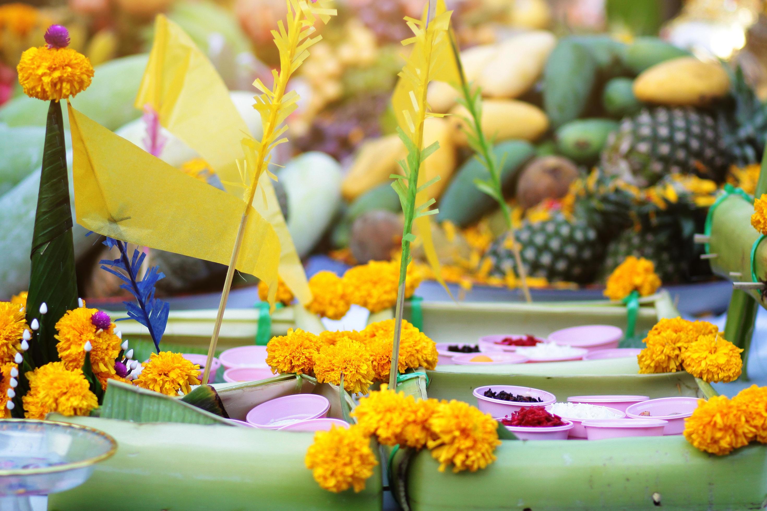 Green Banana leaf and Marigold flowers decoration on table for belief and Worship the gods of Hinduism in Thailand Stock Free