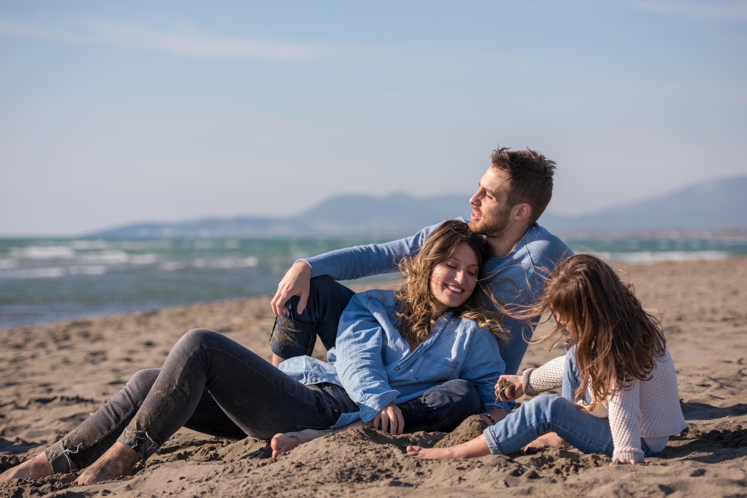 Young family enjoying vecation during autumn Stock Free