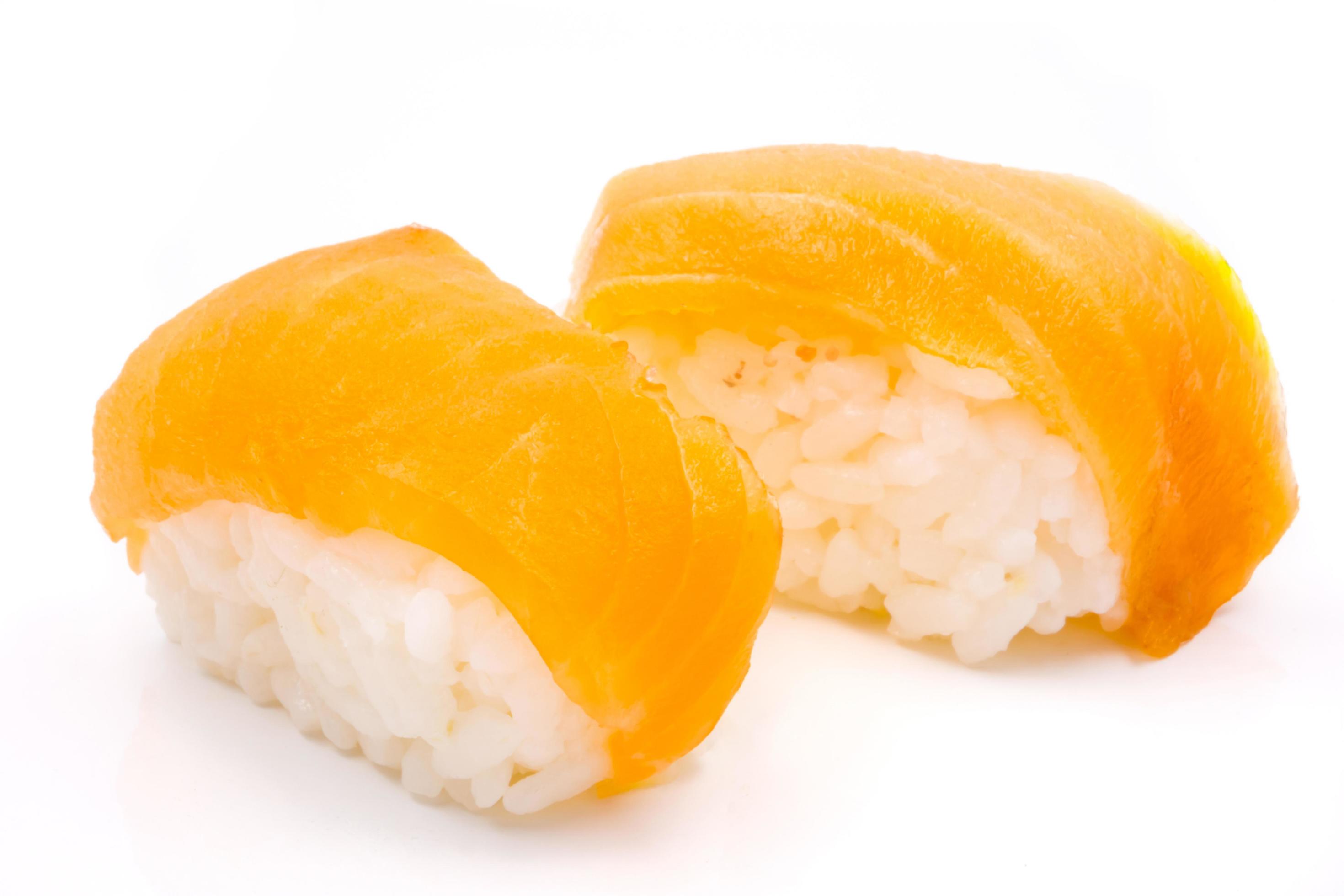 Sushi, japanese food, rice with salmon on white background. Stock Free