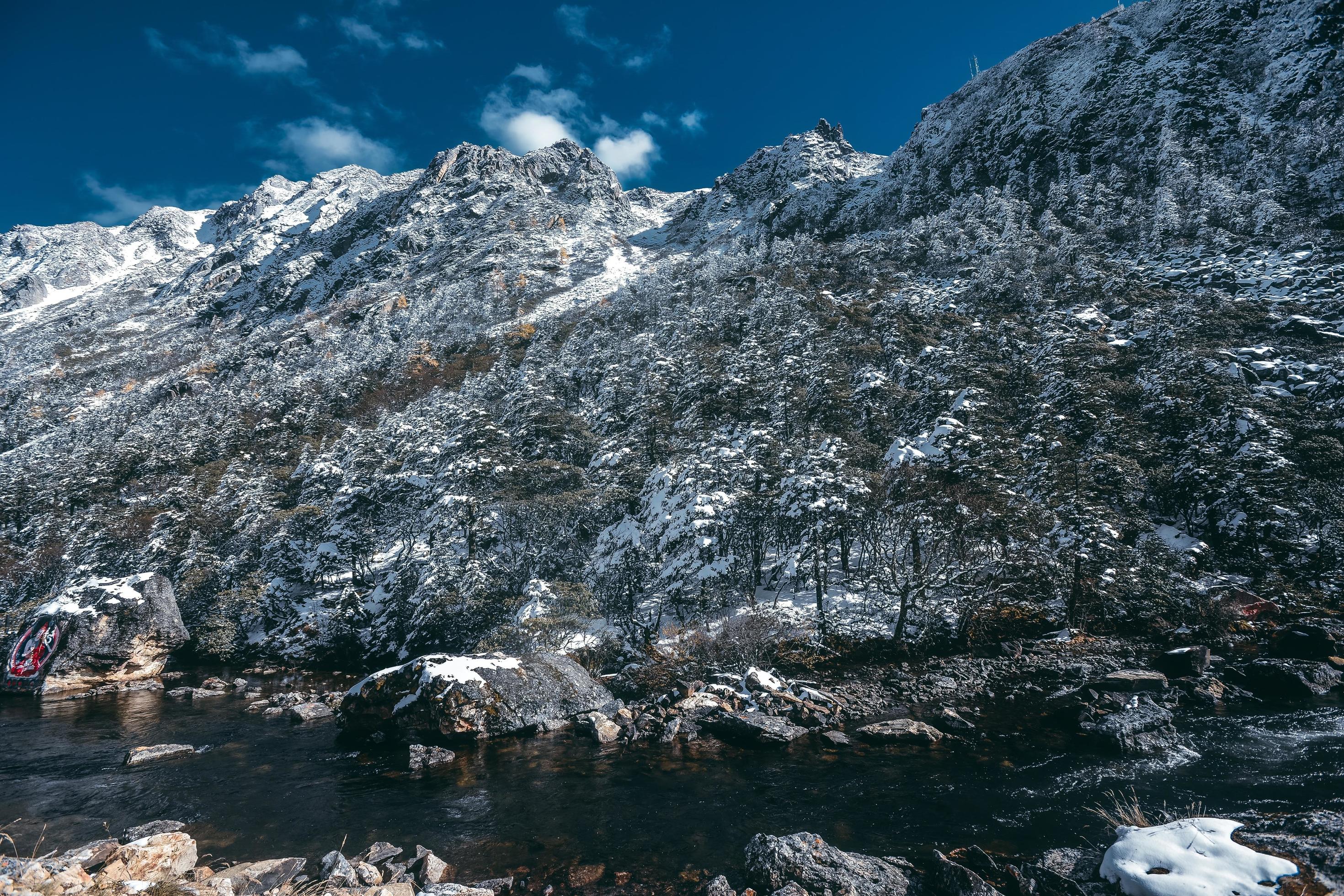 Spectacular scenery in the high mountains of western Sichuan, China, with different seasons Stock Free