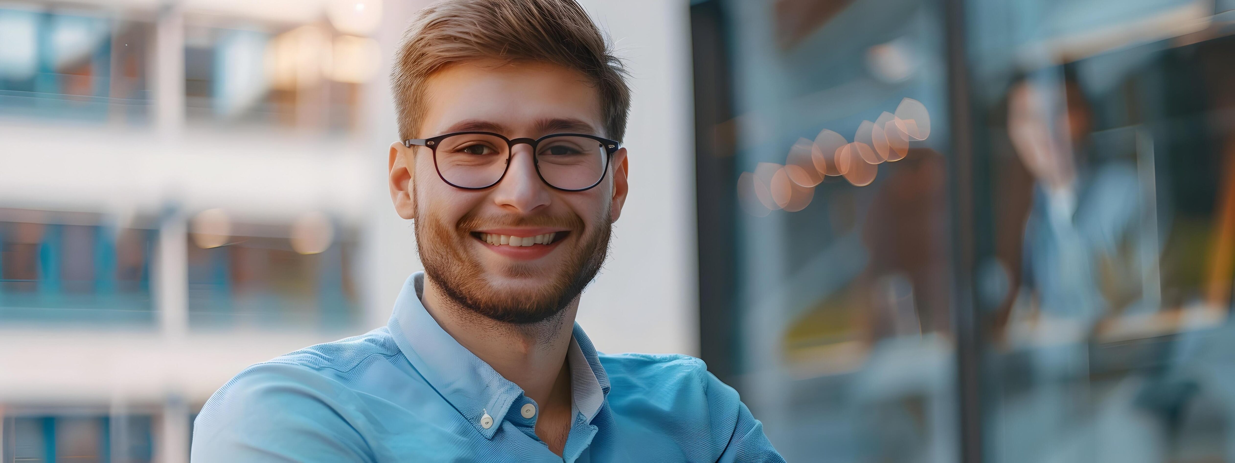 Confident Young Corporate Manager Smiling at Office Stock Free