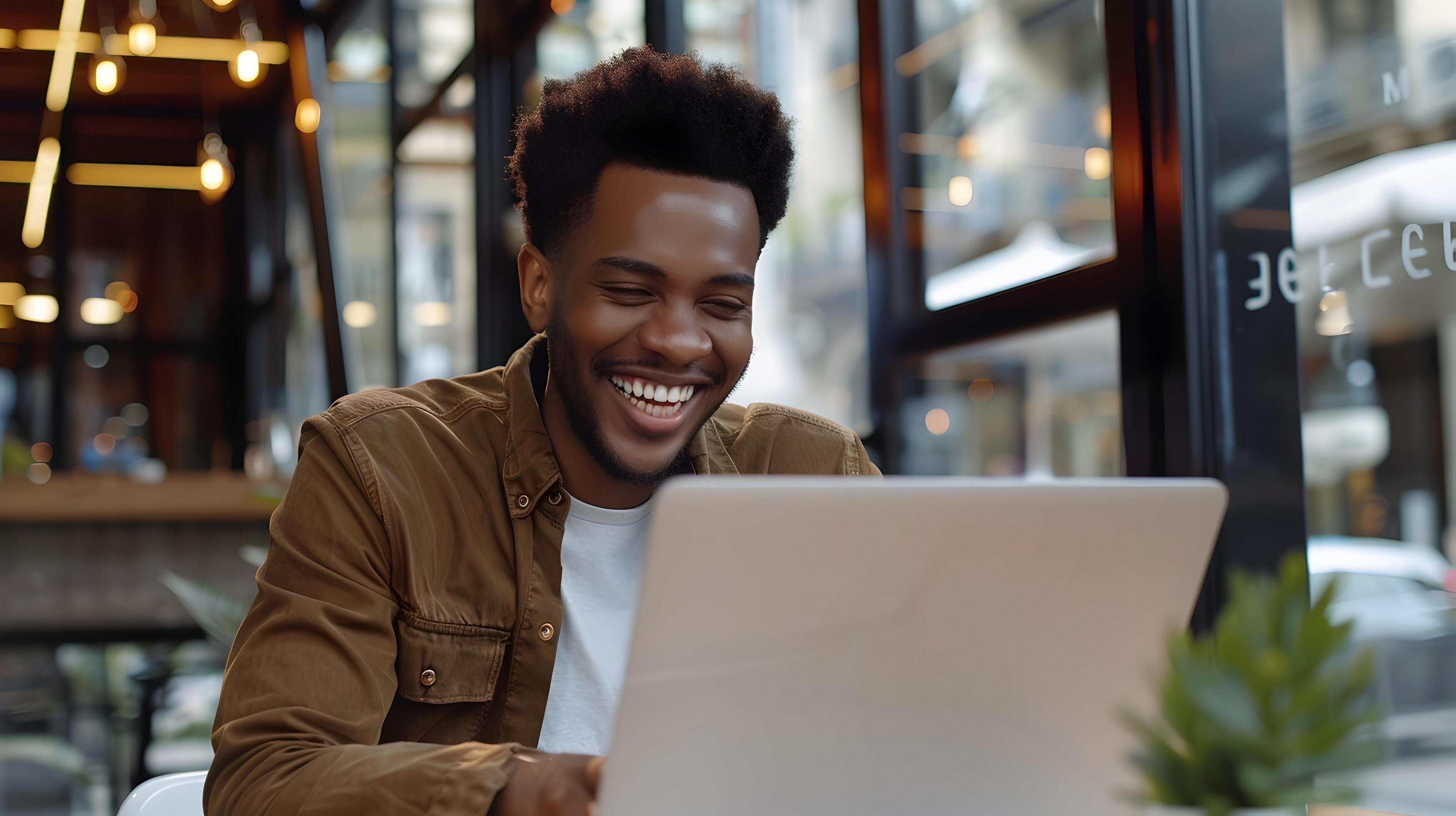 Confident Young Professional Businessman Working Intently on Laptop Stock Free