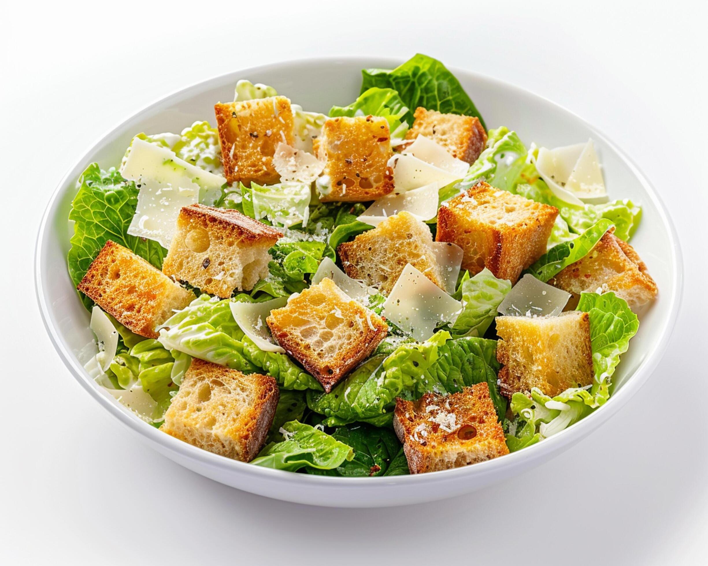 a white bowl filled with a salad Stock Free