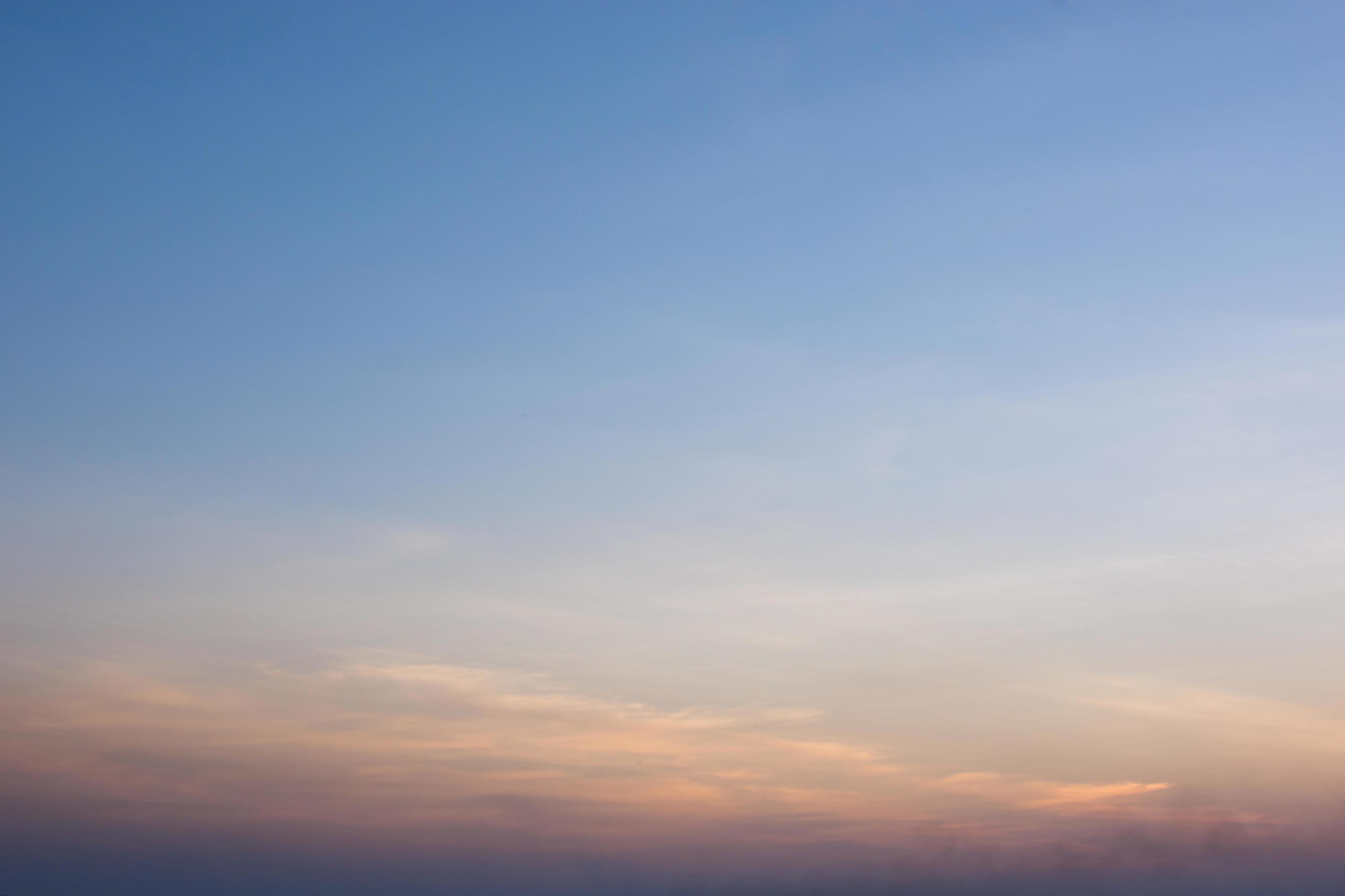 The sky in orange and blue shades, nature background. Stock Free