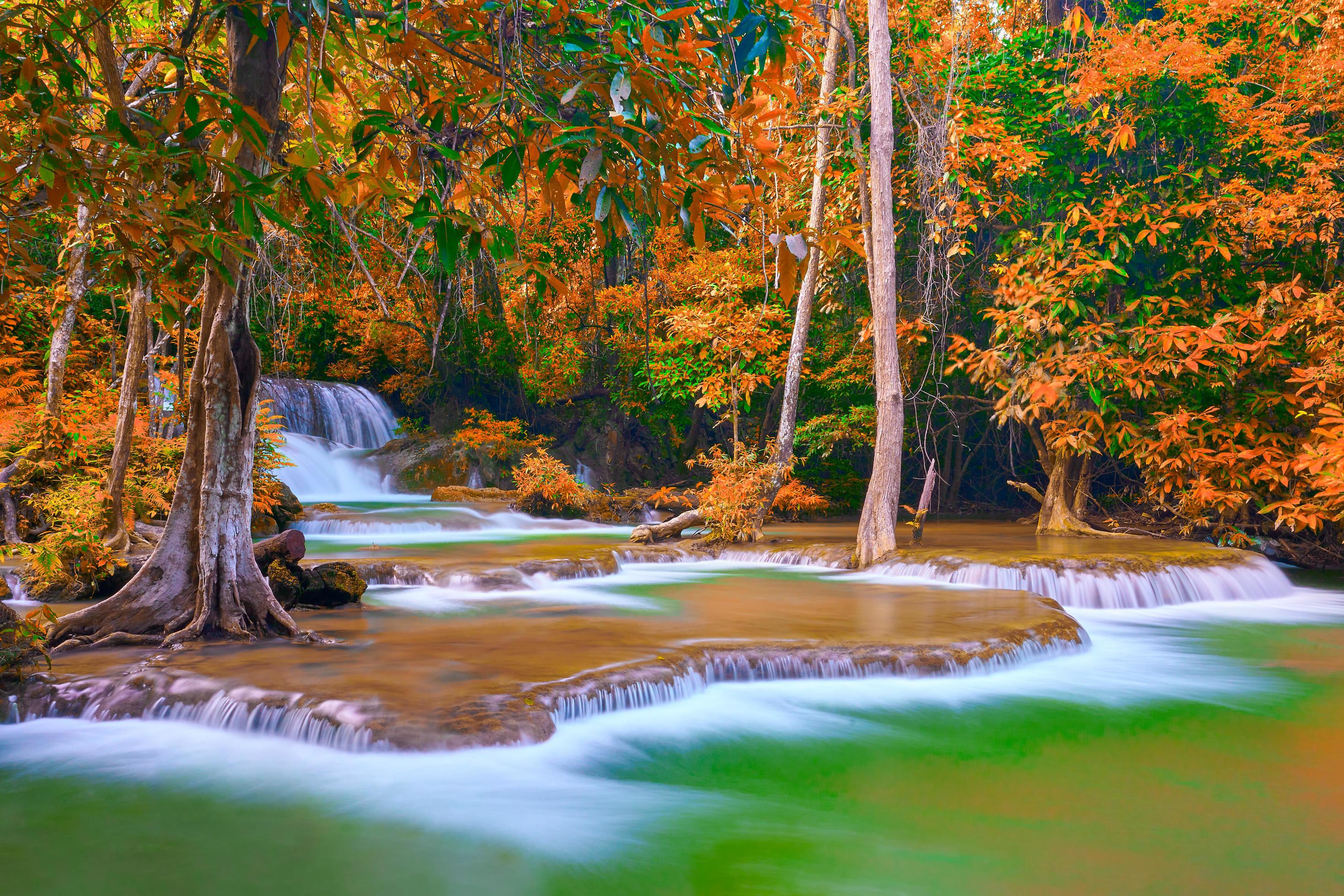 the great waterfall in Thailand, the Onsen atmosphere. beautiful deep forest waterfall in Thailand. Stock Free