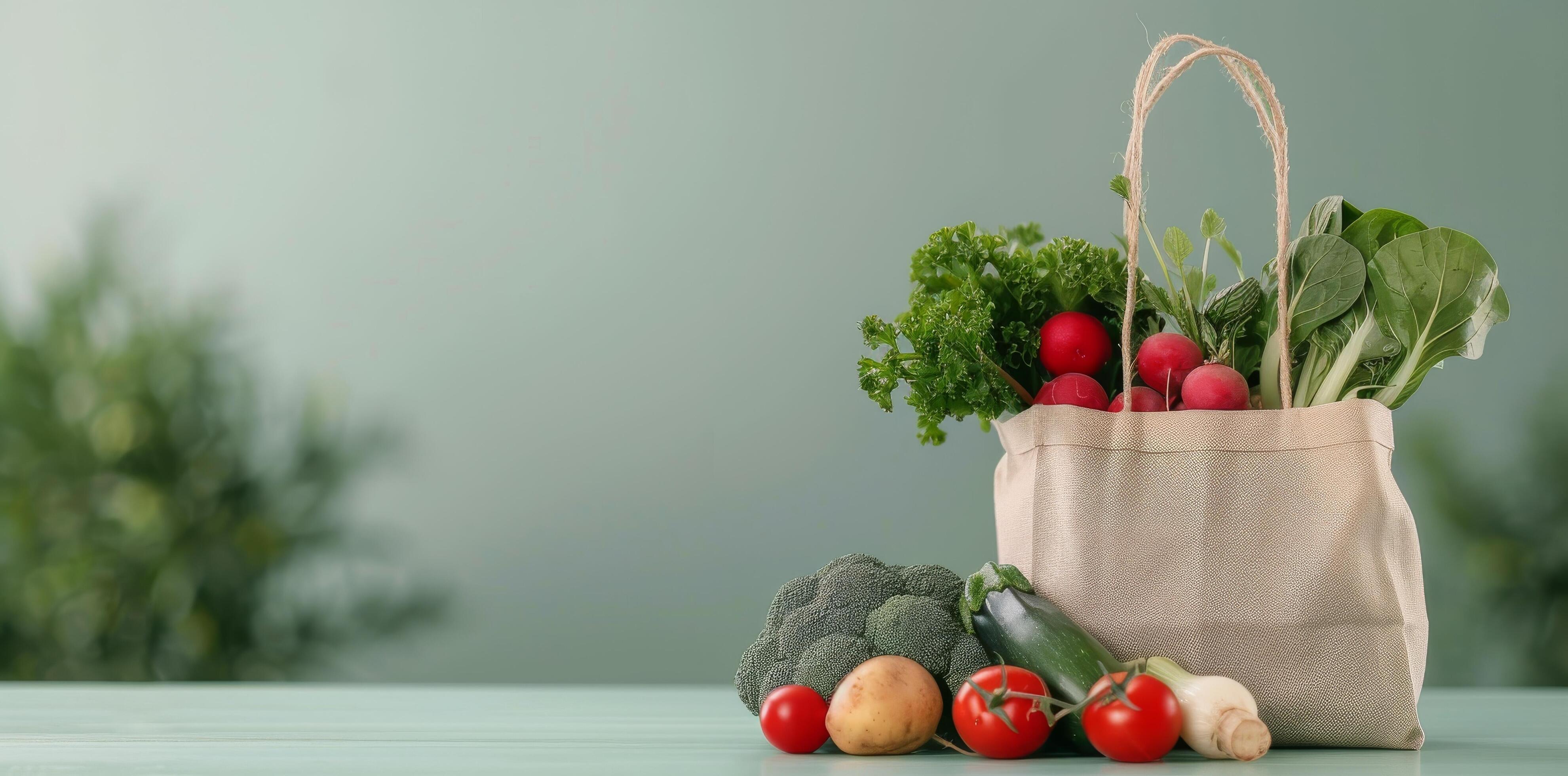 Fresh Vegetables in Eco-Friendly Bag on Mint Green Background Stock Free