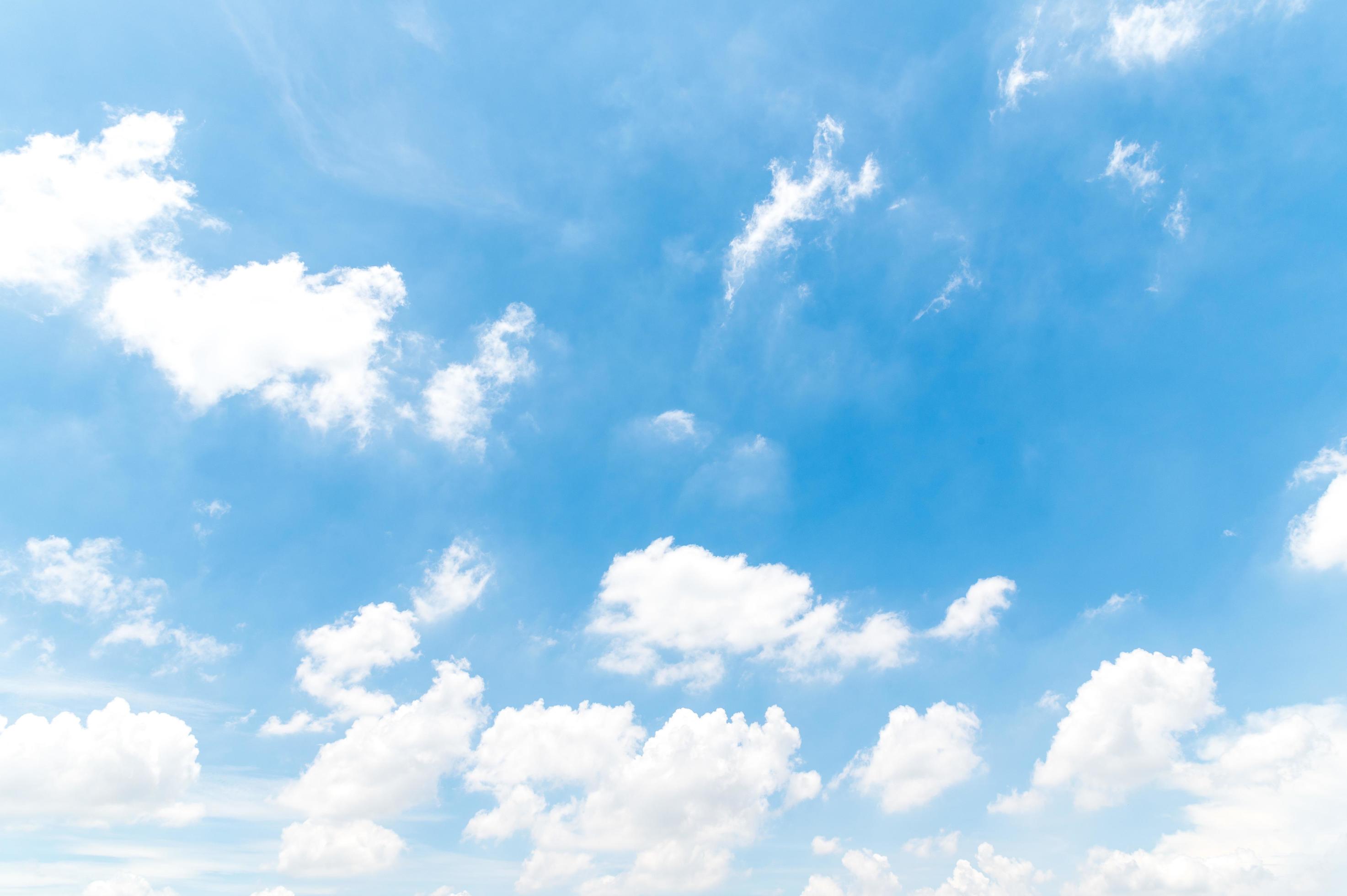 Beautiful white fluffy clouds in blue sky. Nature background from white clouds in sunny day Stock Free