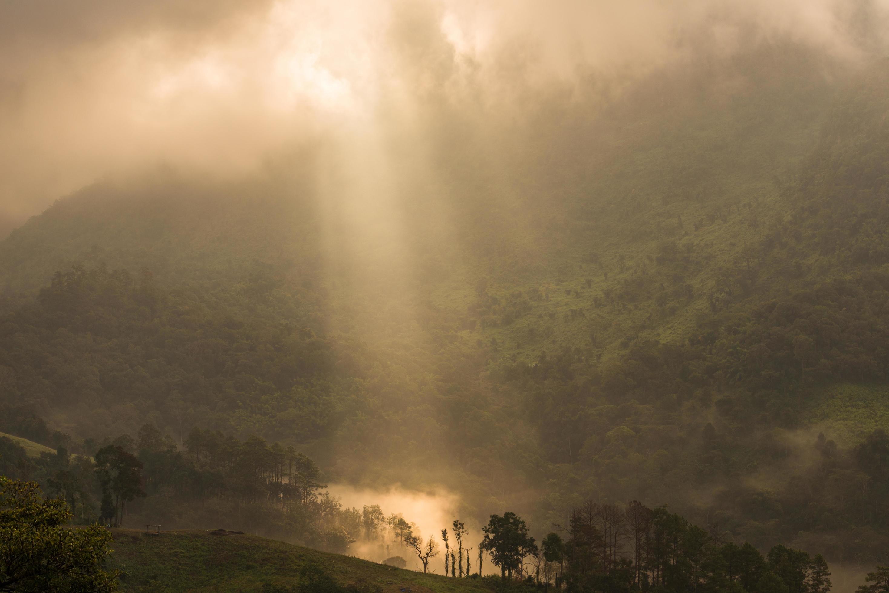 The sunbeam shining to the land in the countryside of Chiang Mai province of Thailand. Stock Free