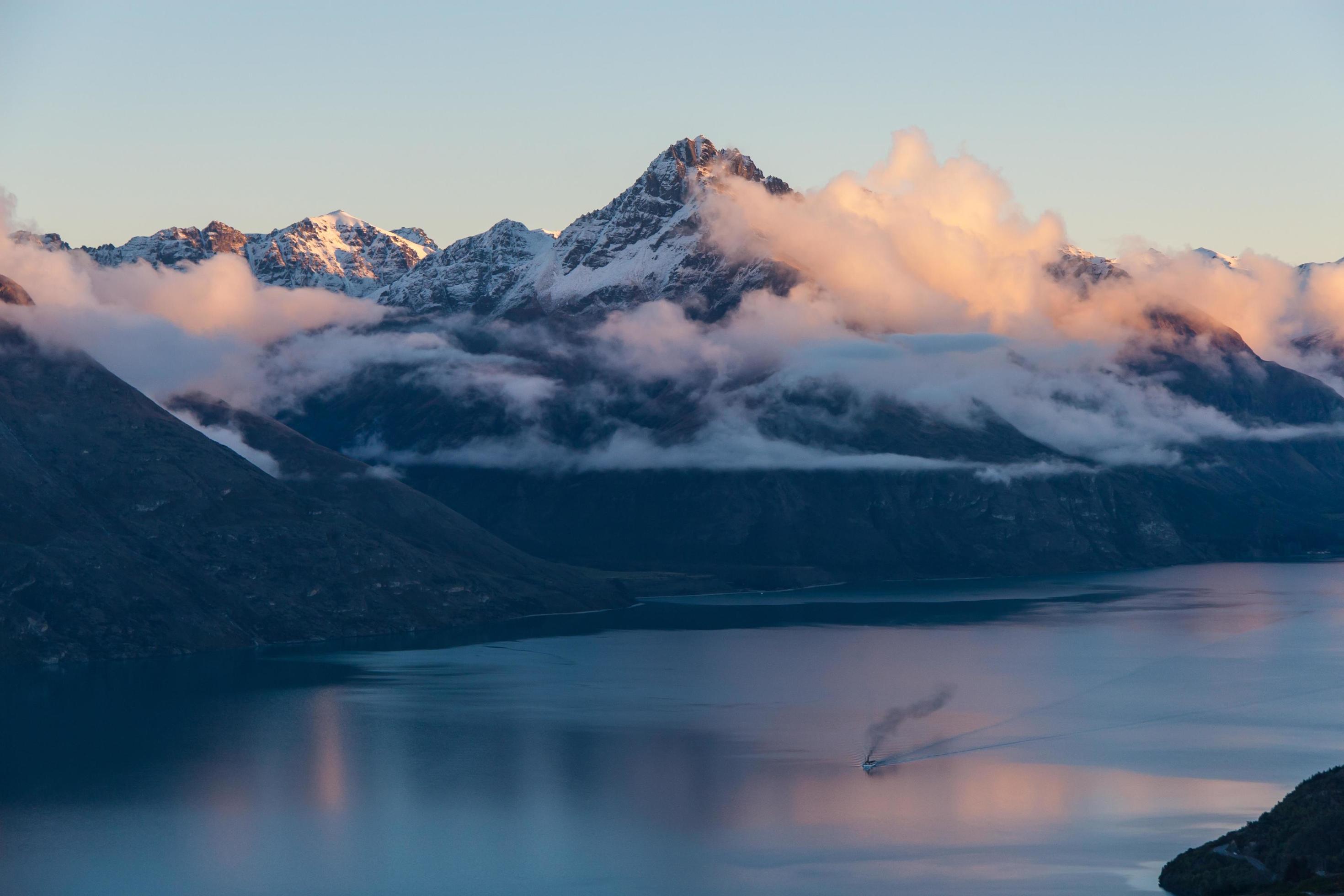 Aerial view of a sunset on a foggy mountain Stock Free