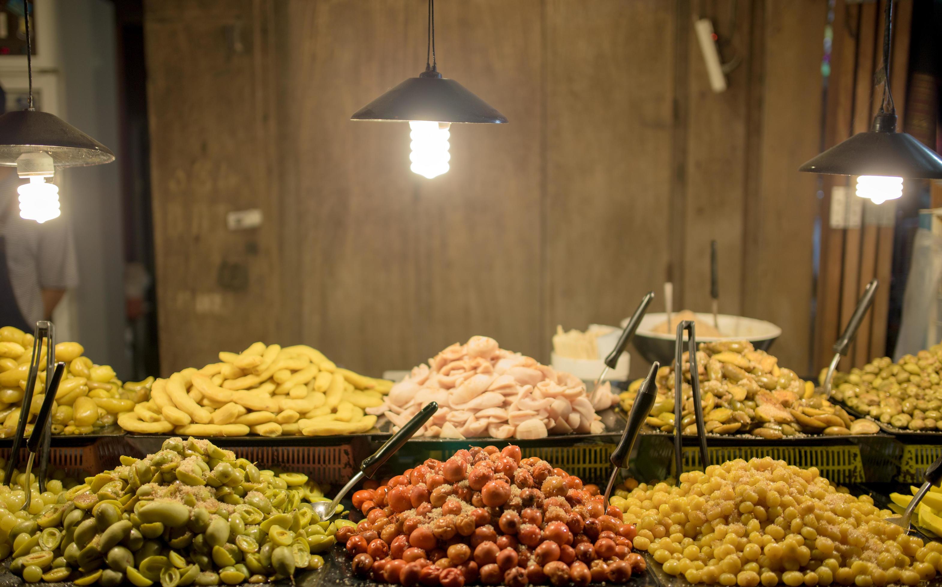 Pickled fruit in walking street Chiang Khan Loei street food in Thailand. Stock Free