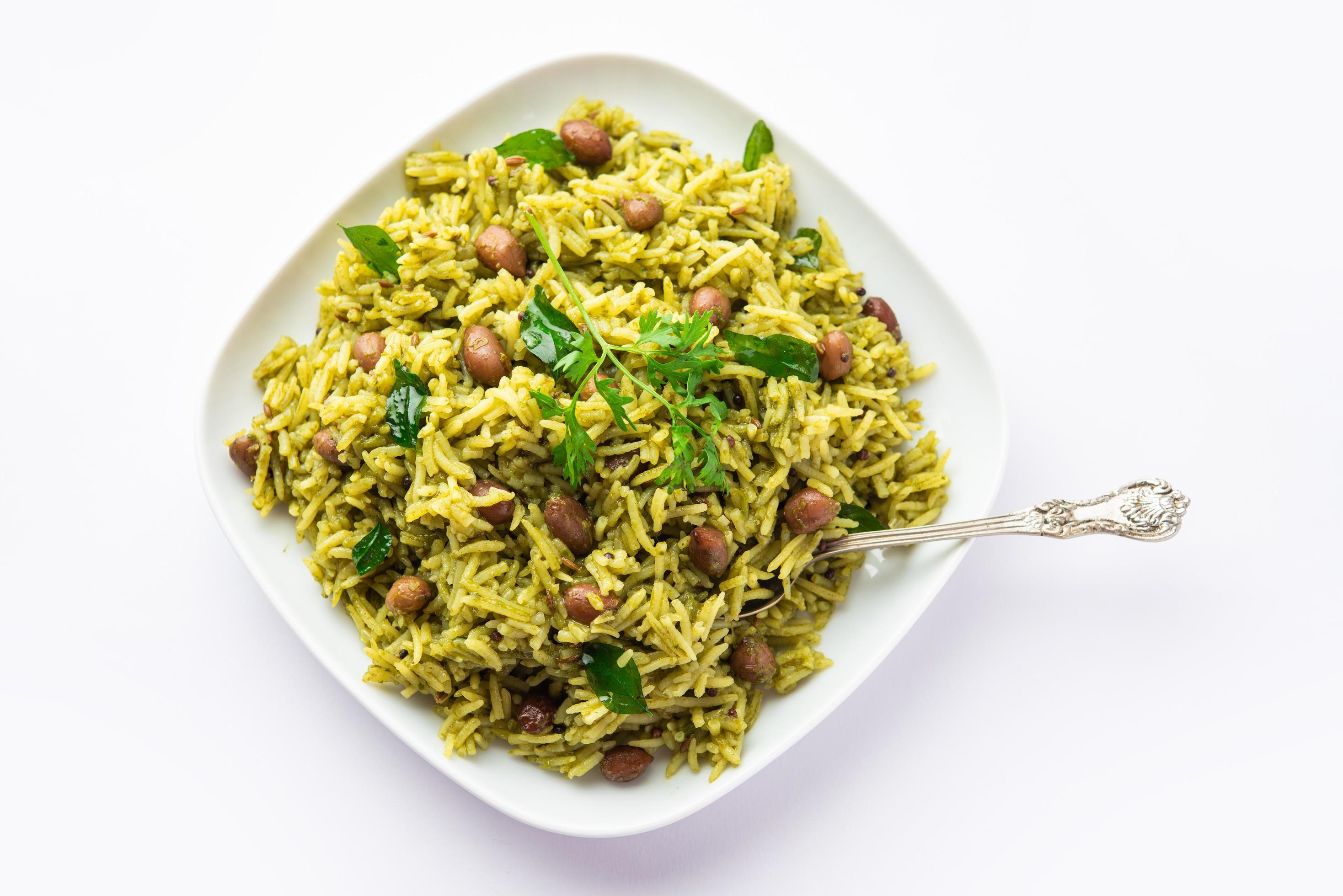 Palak khichdi is a one pot nutritious meal of mung lentils and rice with spinach, Indian food Stock Free