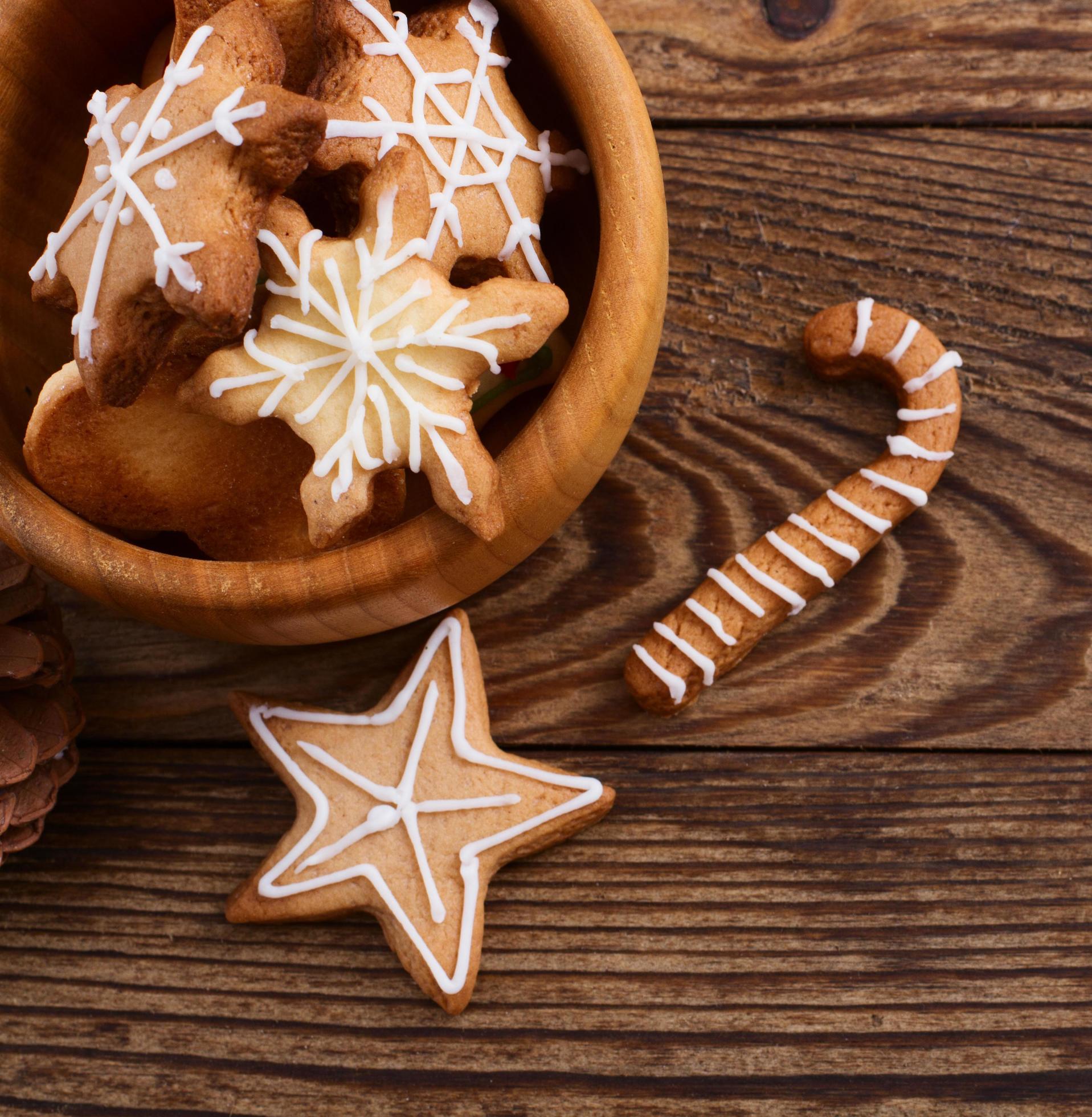 Knar and christmas food sweet cookies on wooden table background. Copy space. Selective focus. Happy new year concept. Stock Free