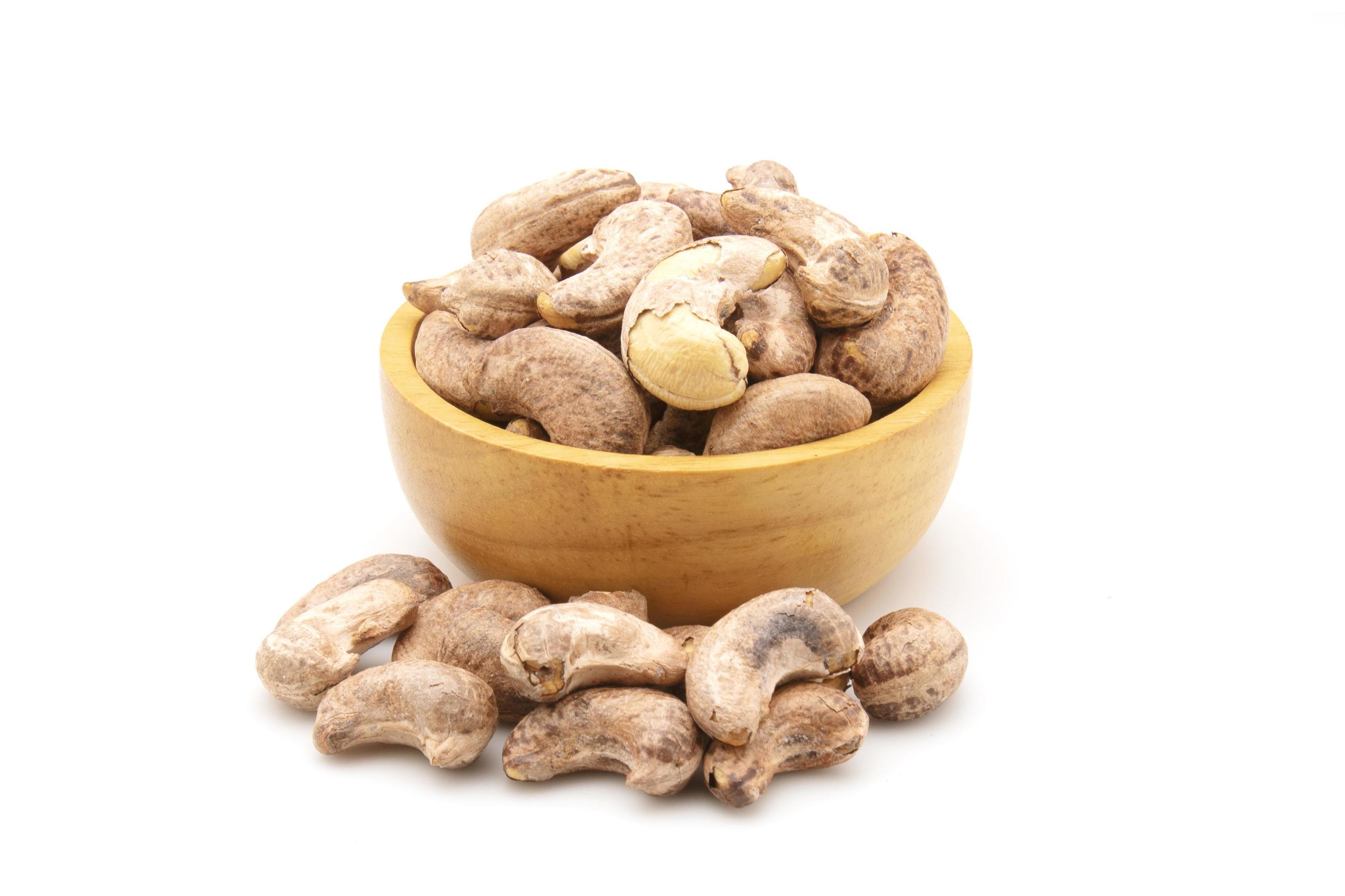 Pile of roasted cashew nut isolated on white background. Food concept Stock Free