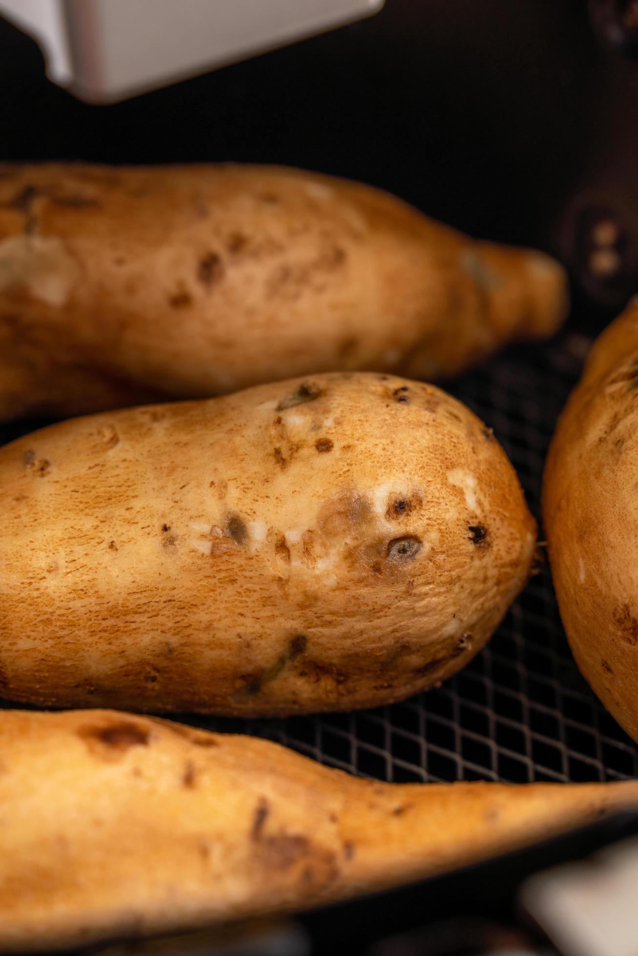 Roasted sweet potato cooked by airfryer at home. Healthy food for diet eating. Stock Free