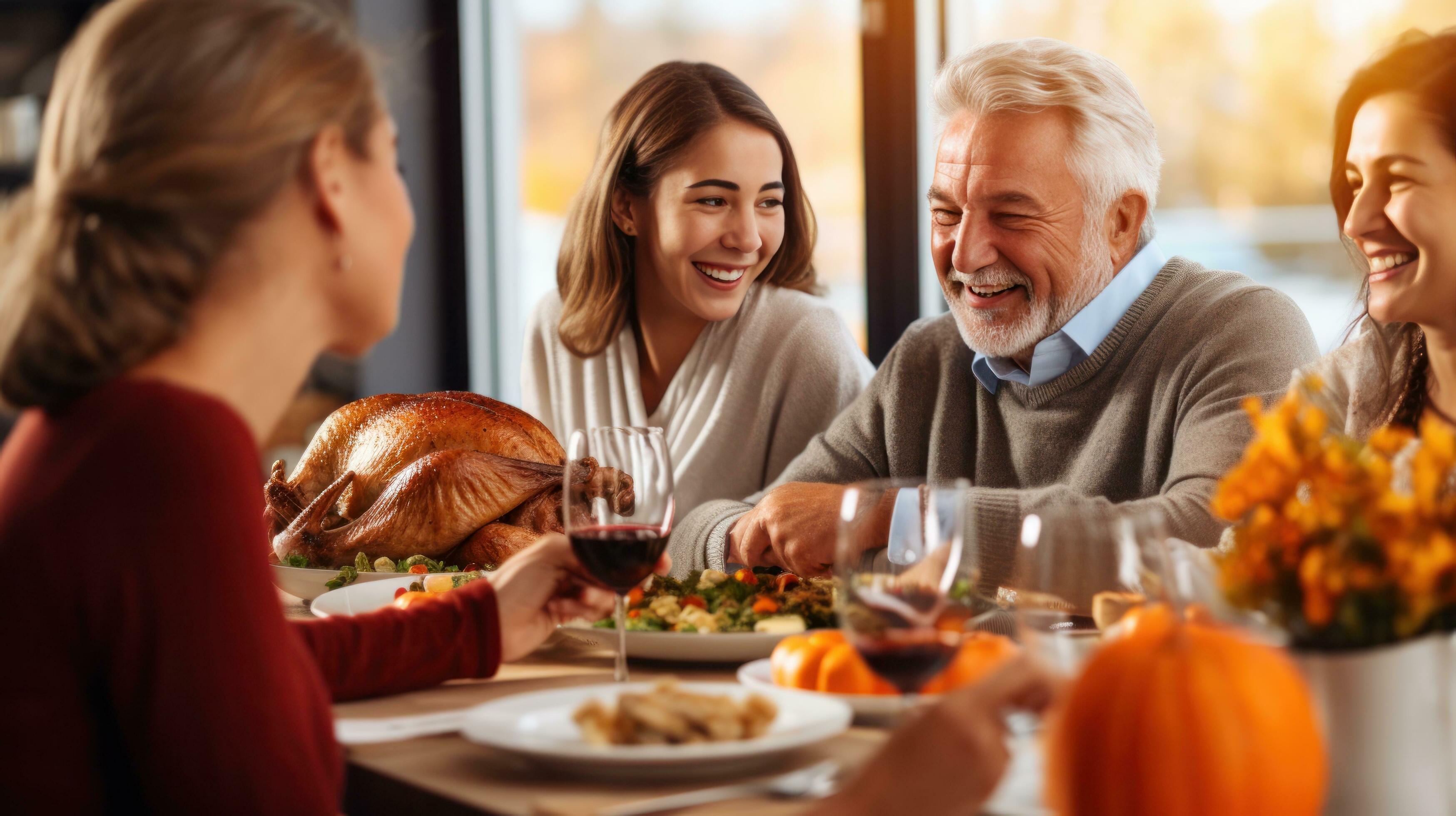 Happy family at Thanksgiving dinner Stock Free