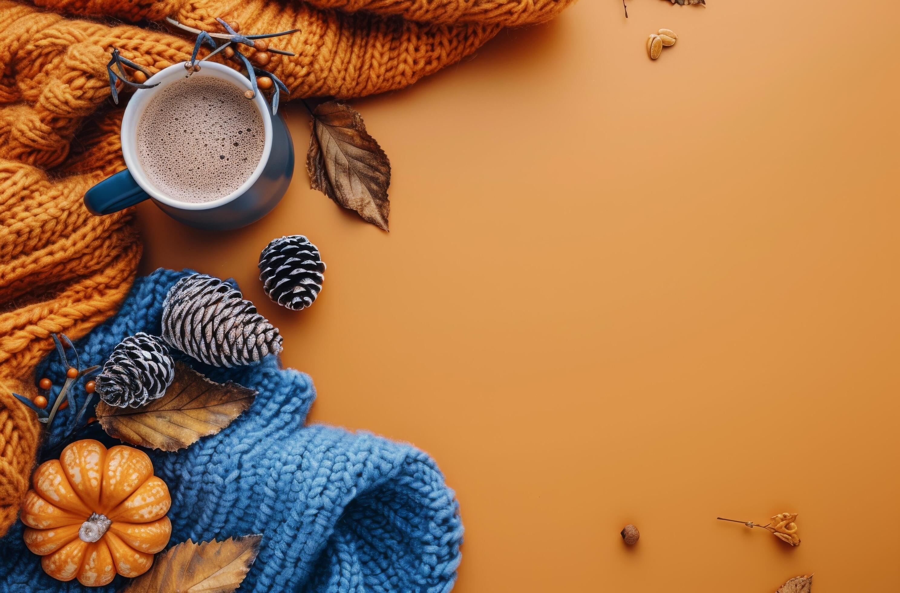 Cozy Autumn Scene With Knitted Scarves, Pumpkins, And A Cup Of Coffee Stock Free