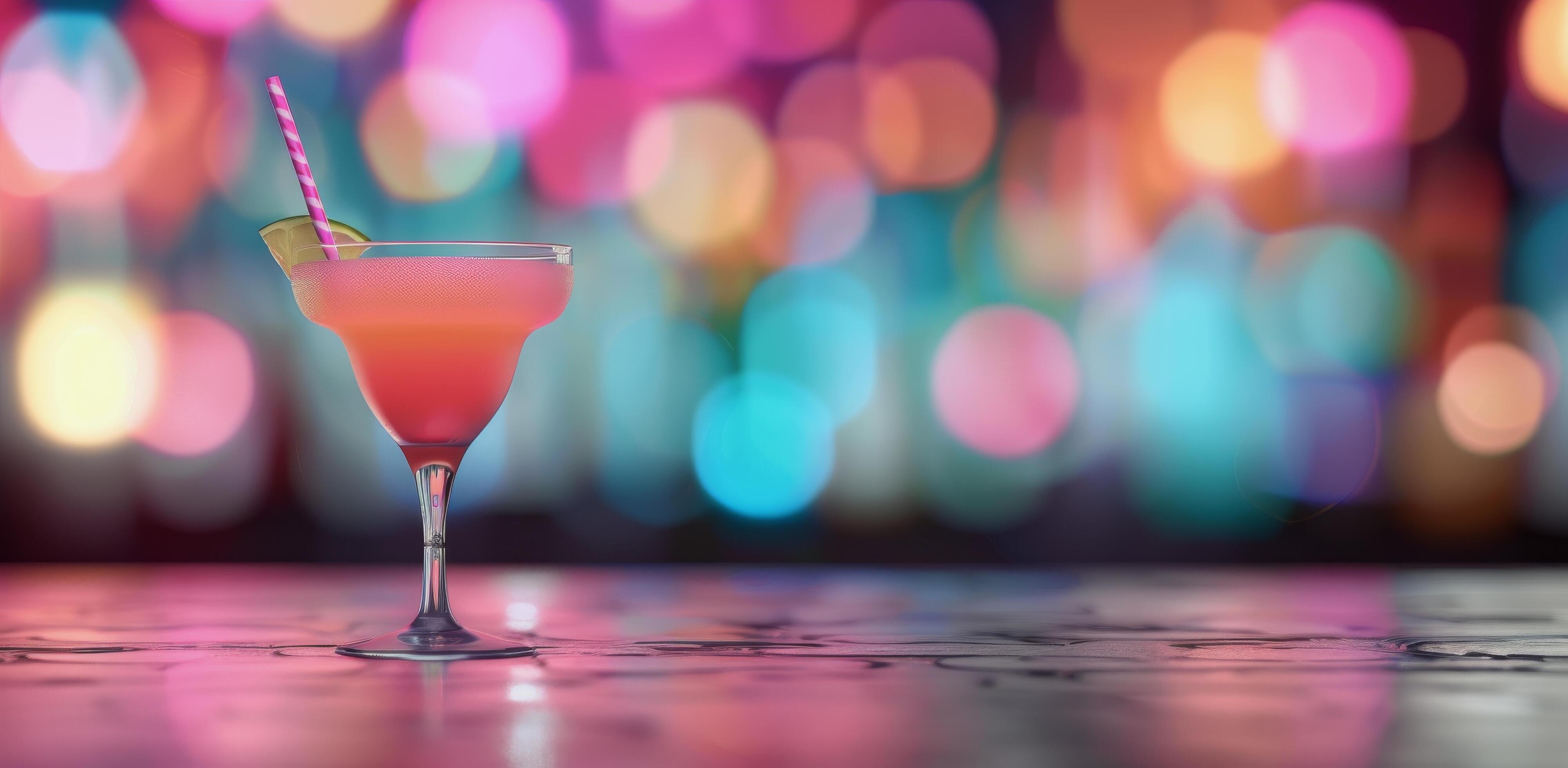 Refreshing Cocktail With Lemon Garnish Against Colorful Bokeh Background Stock Free