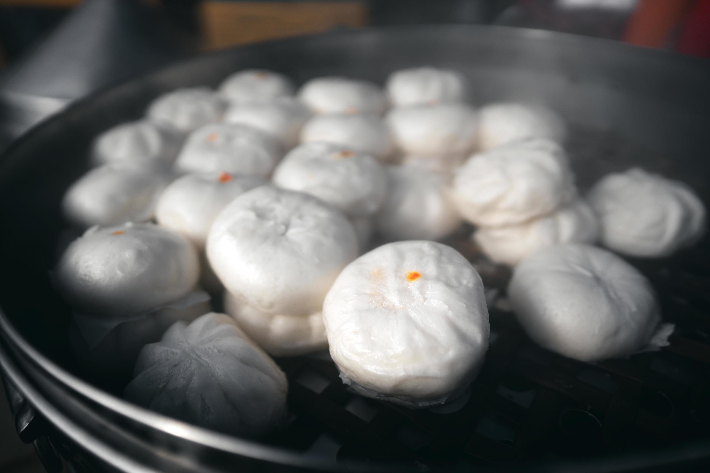 Street food of steaming chinese local style pork bun. Stock Free