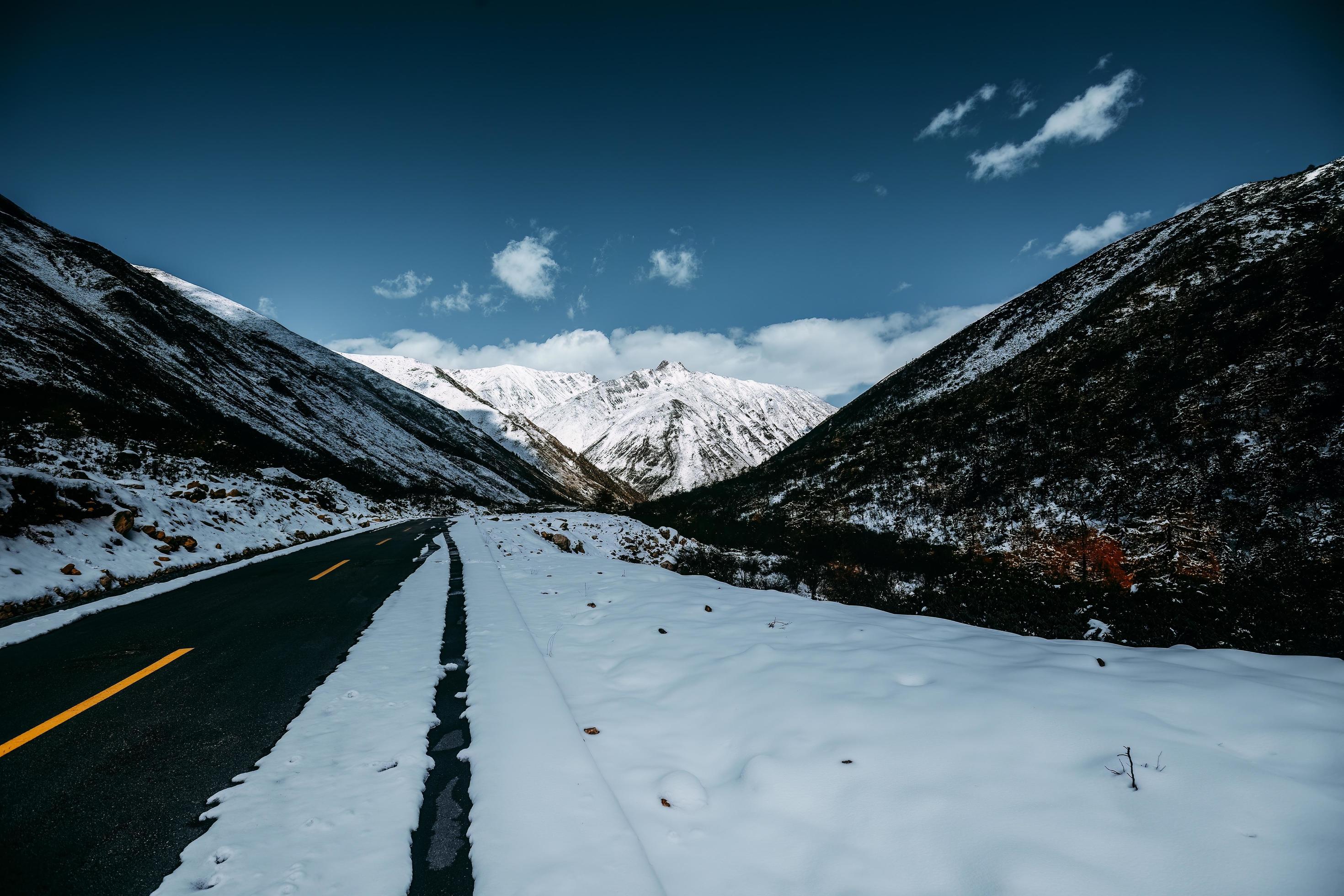 Spectacular scenery in the high mountains of western Sichuan, China, with different seasons Stock Free