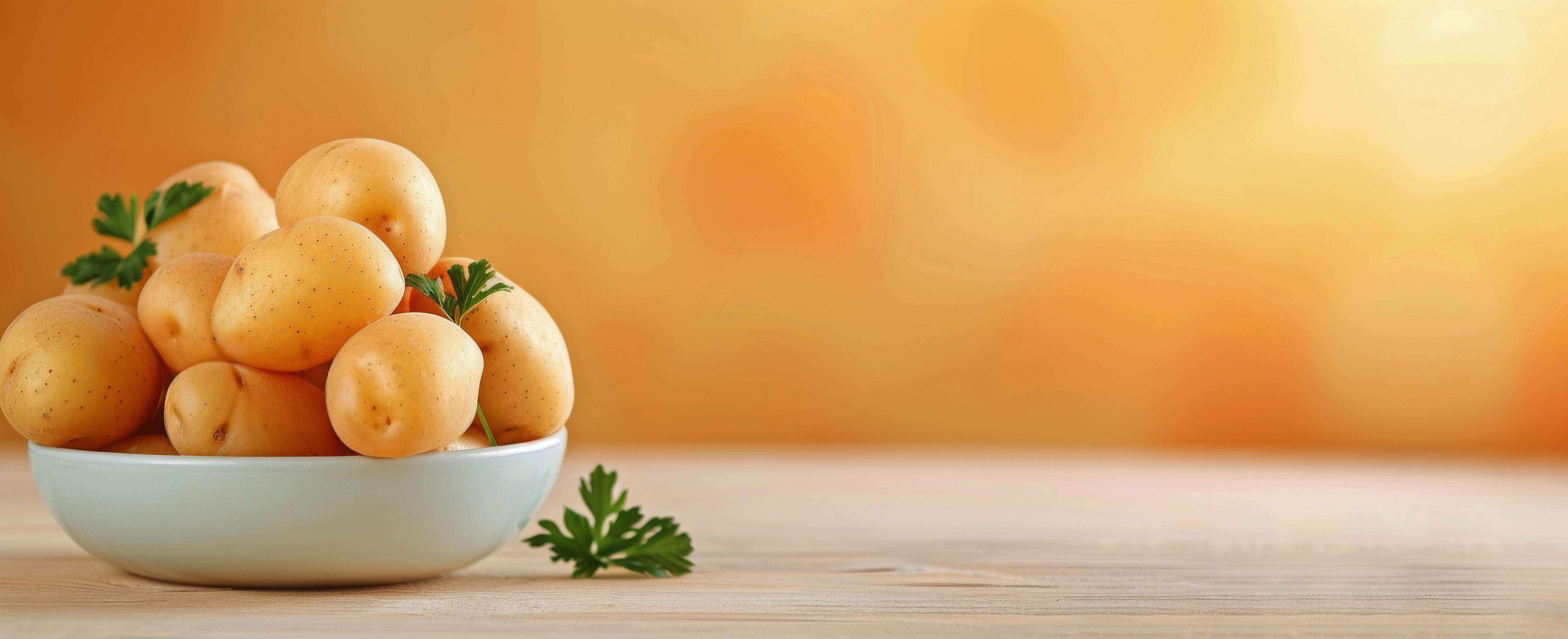 Fresh Potatoes on Yellow Background in Natural Light Stock Free