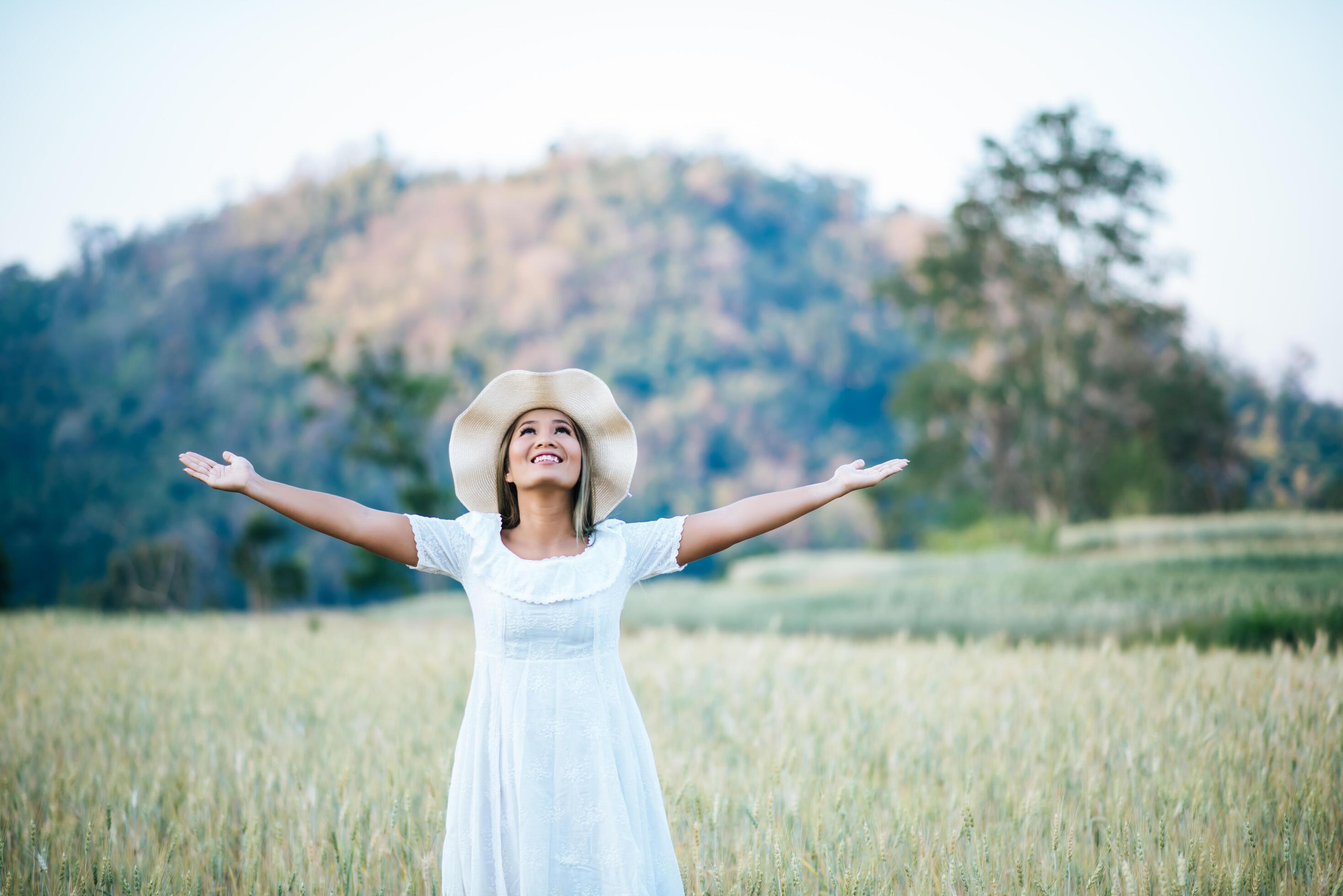 Woman in the hat happiness in the nature Stock Free