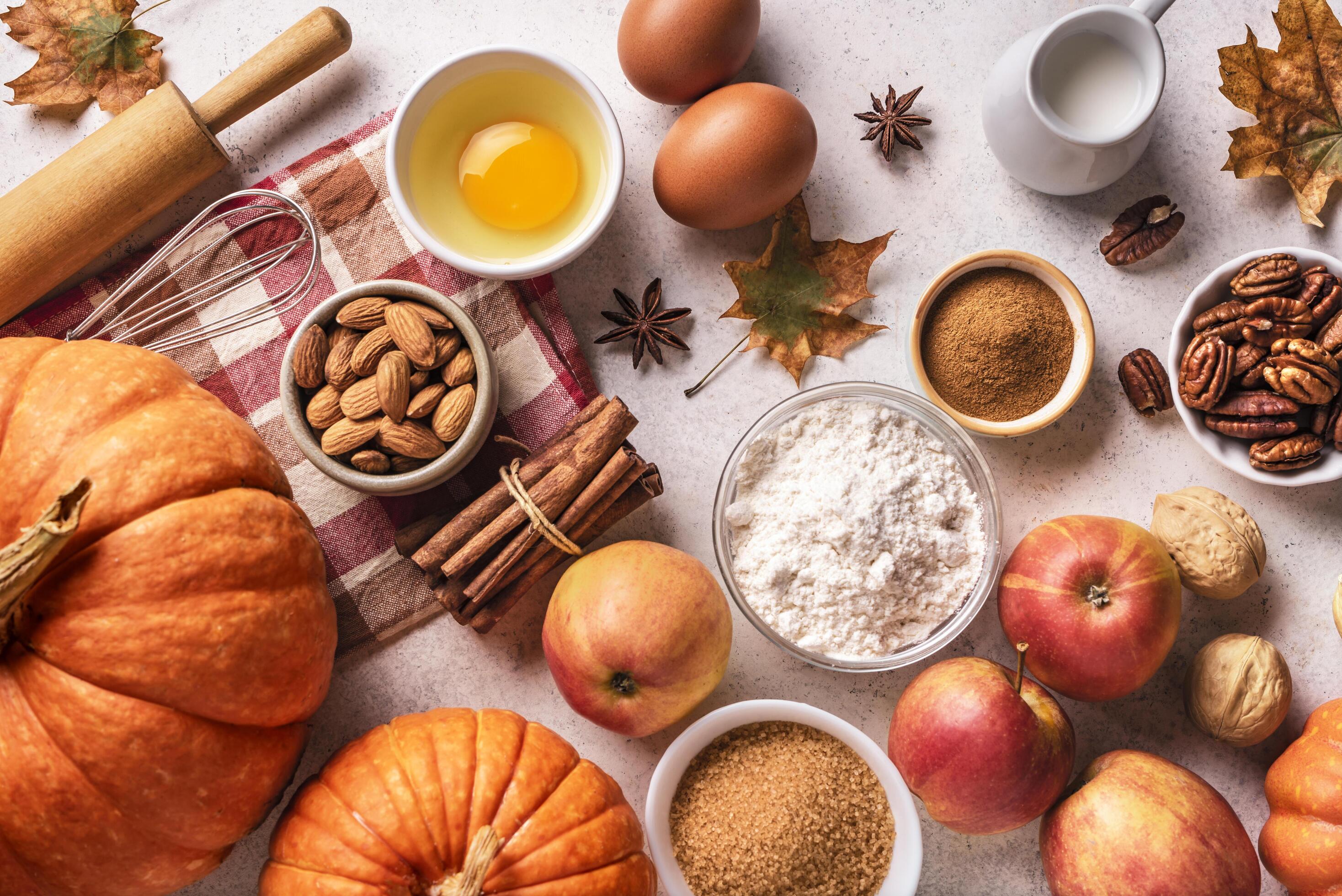 
									Autumn baking background with pumpkins, apples and nuts Stock Free