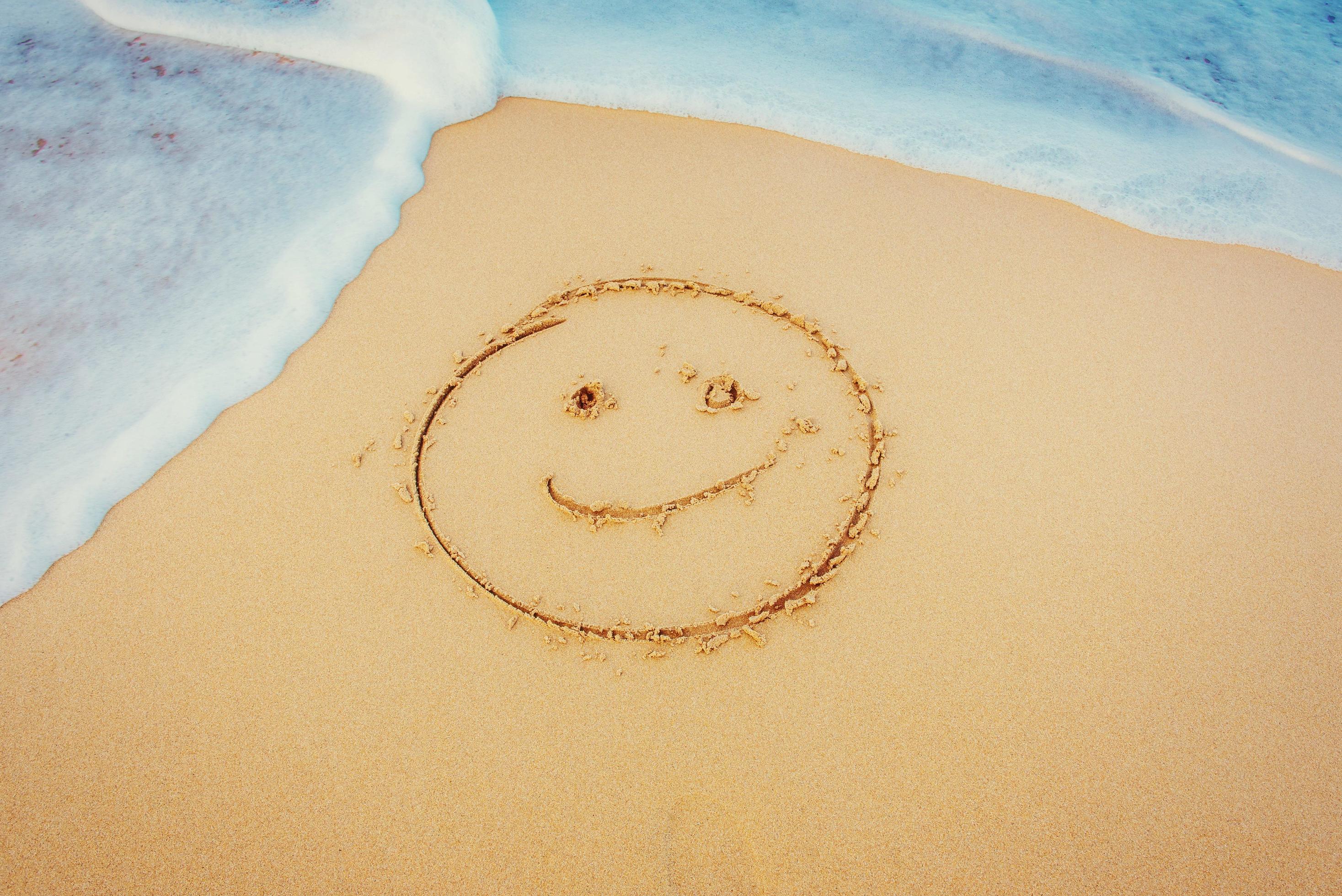 The drawings in the sand at the beach Stock Free