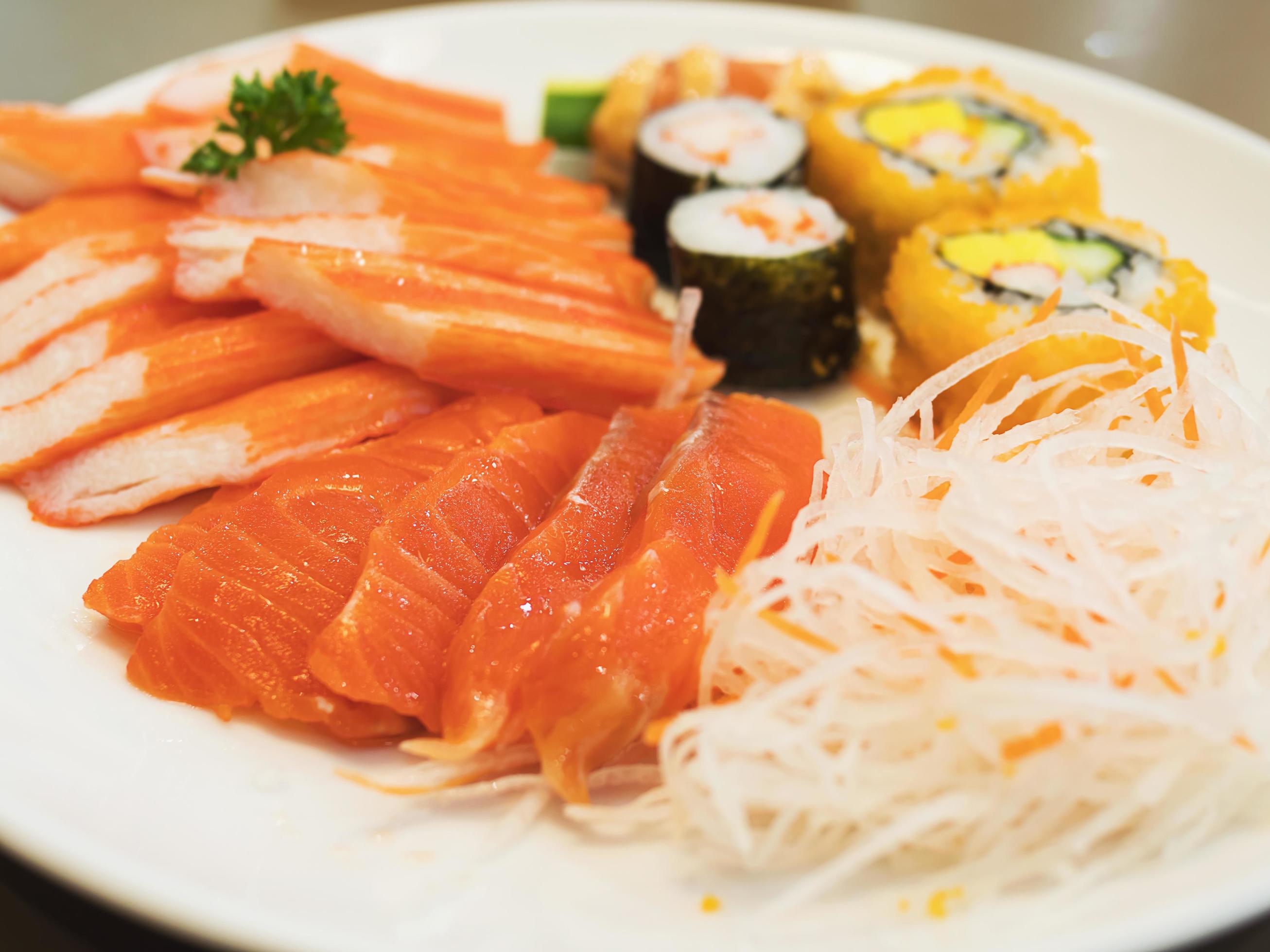 Fresh colorful Japanese food on the white plate, selective focused Stock Free