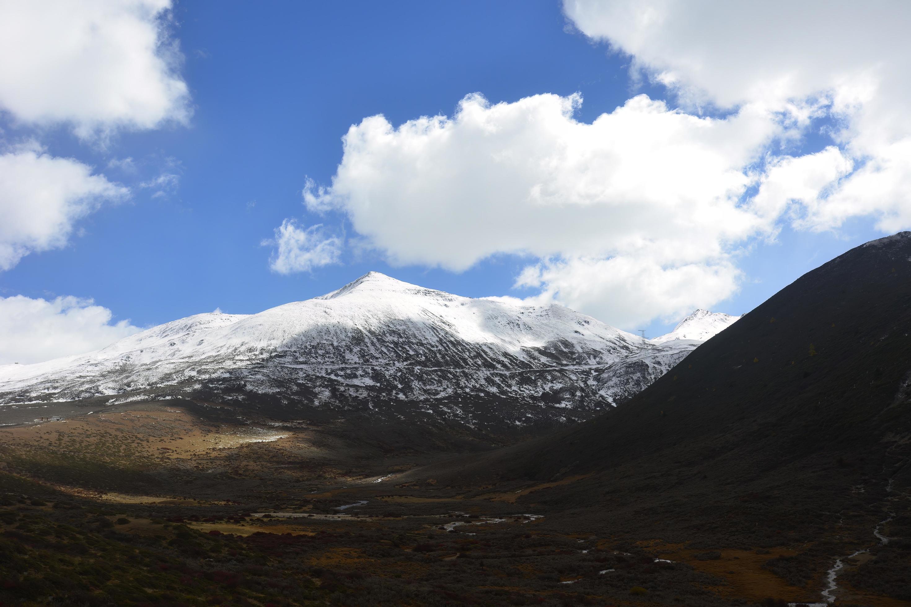 Spectacular scenery in the high mountains of western Sichuan, China, with different seasons Stock Free