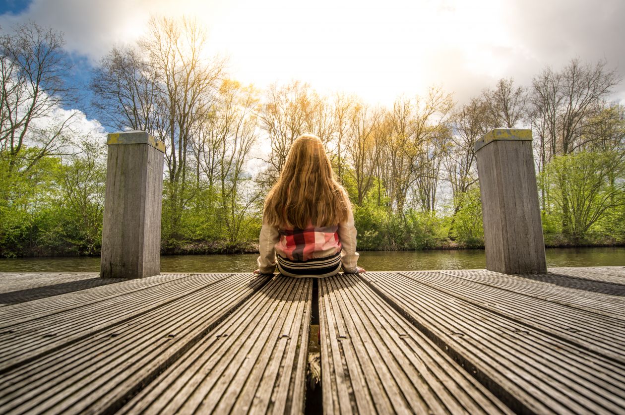 Sitting by the water Stock Free