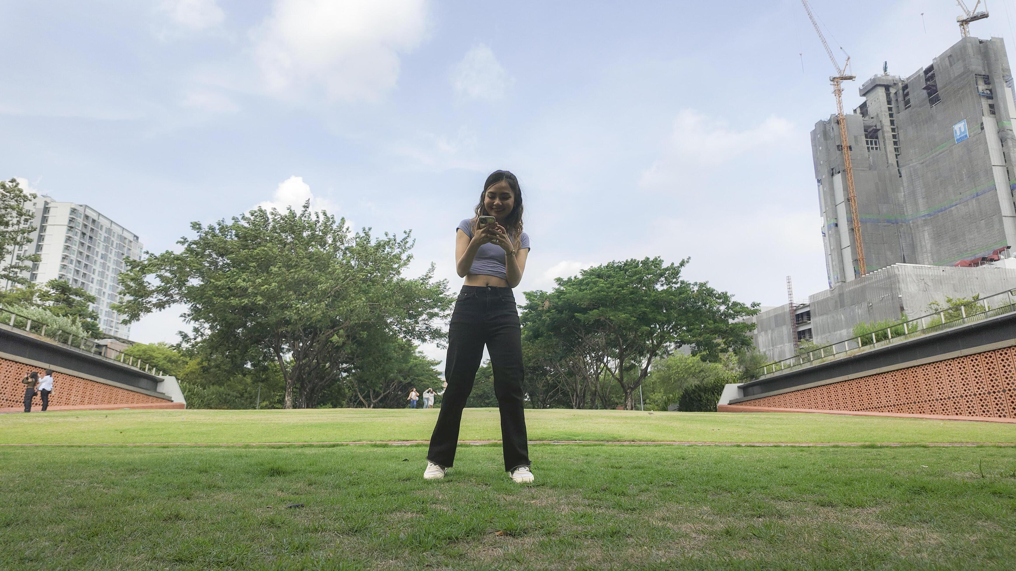 Asian women do freestyle hip hop and breakdancing in a public space in the middle of the city. With a cheerful and happy attitude Stock Free