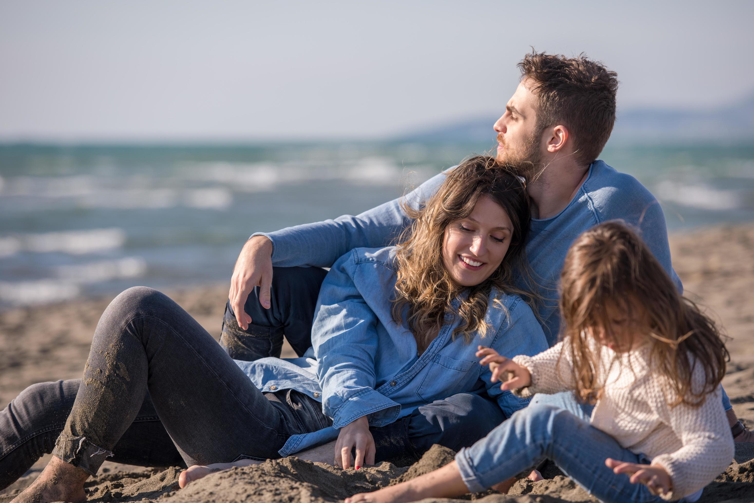 Young family enjoying vecation during autumn Stock Free