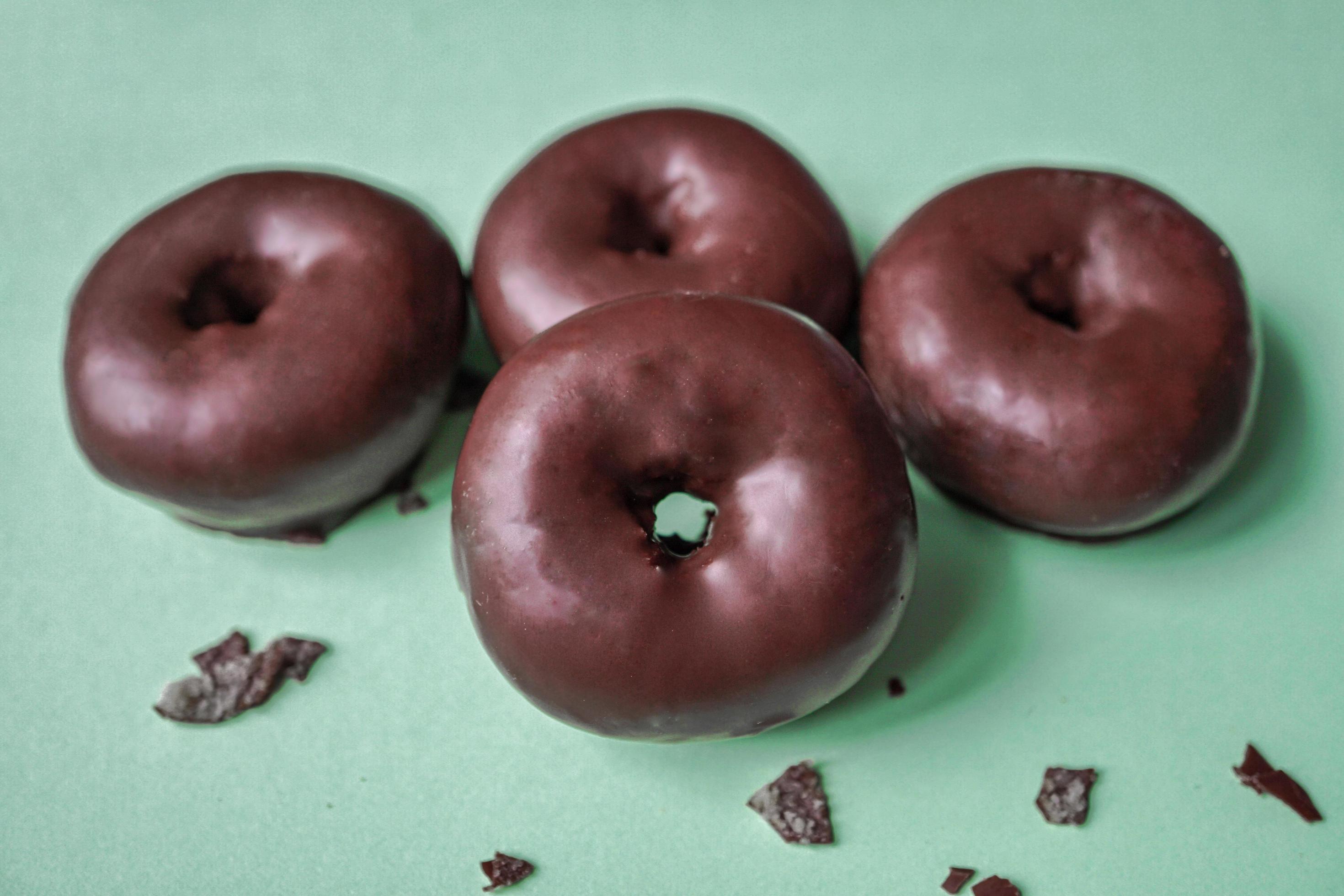 tasty chocolate donuts for breakfast, unhealthy food Stock Free