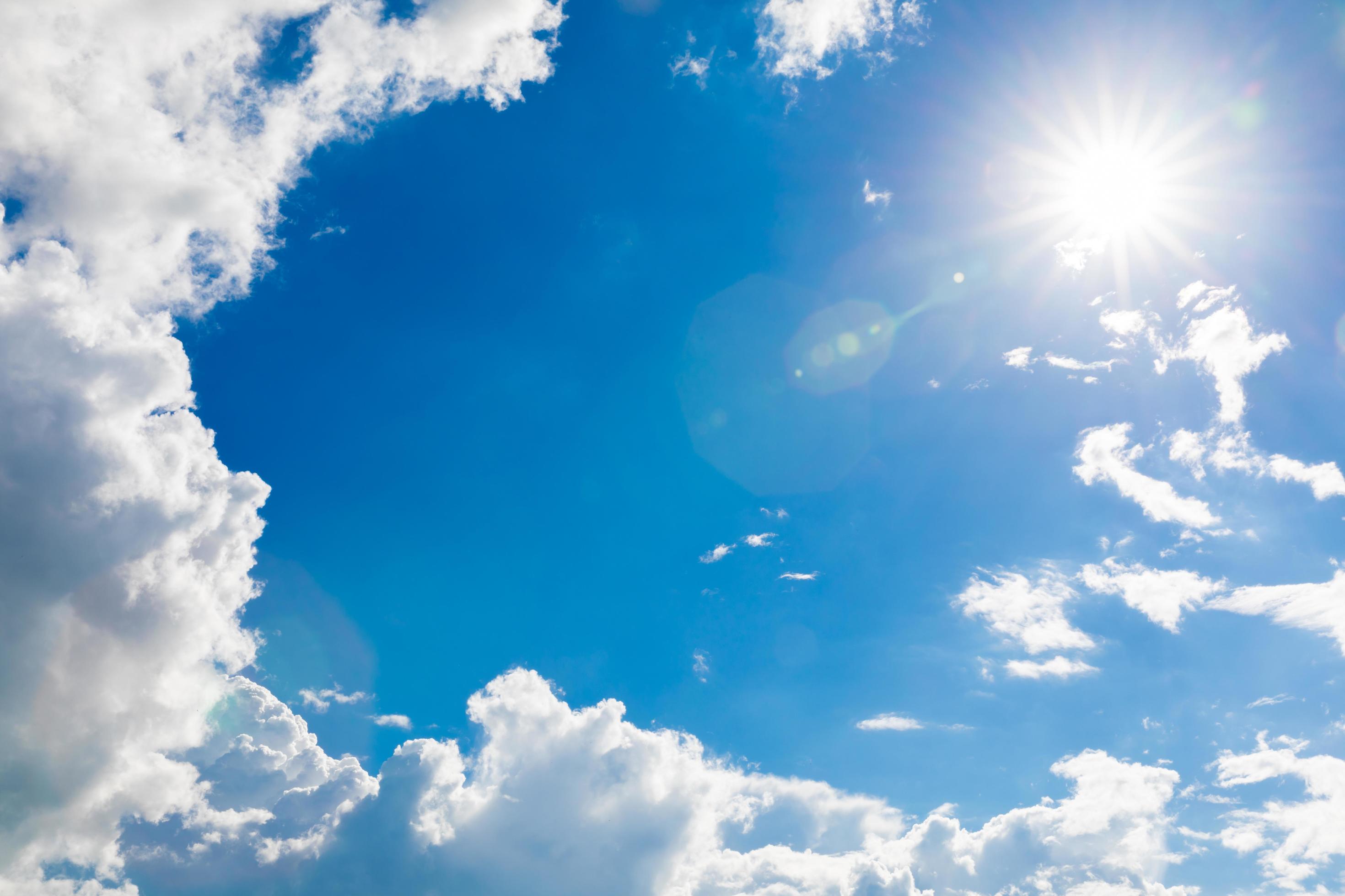 Blue sky with white clouds and sun Beautiful natural background Stock Free