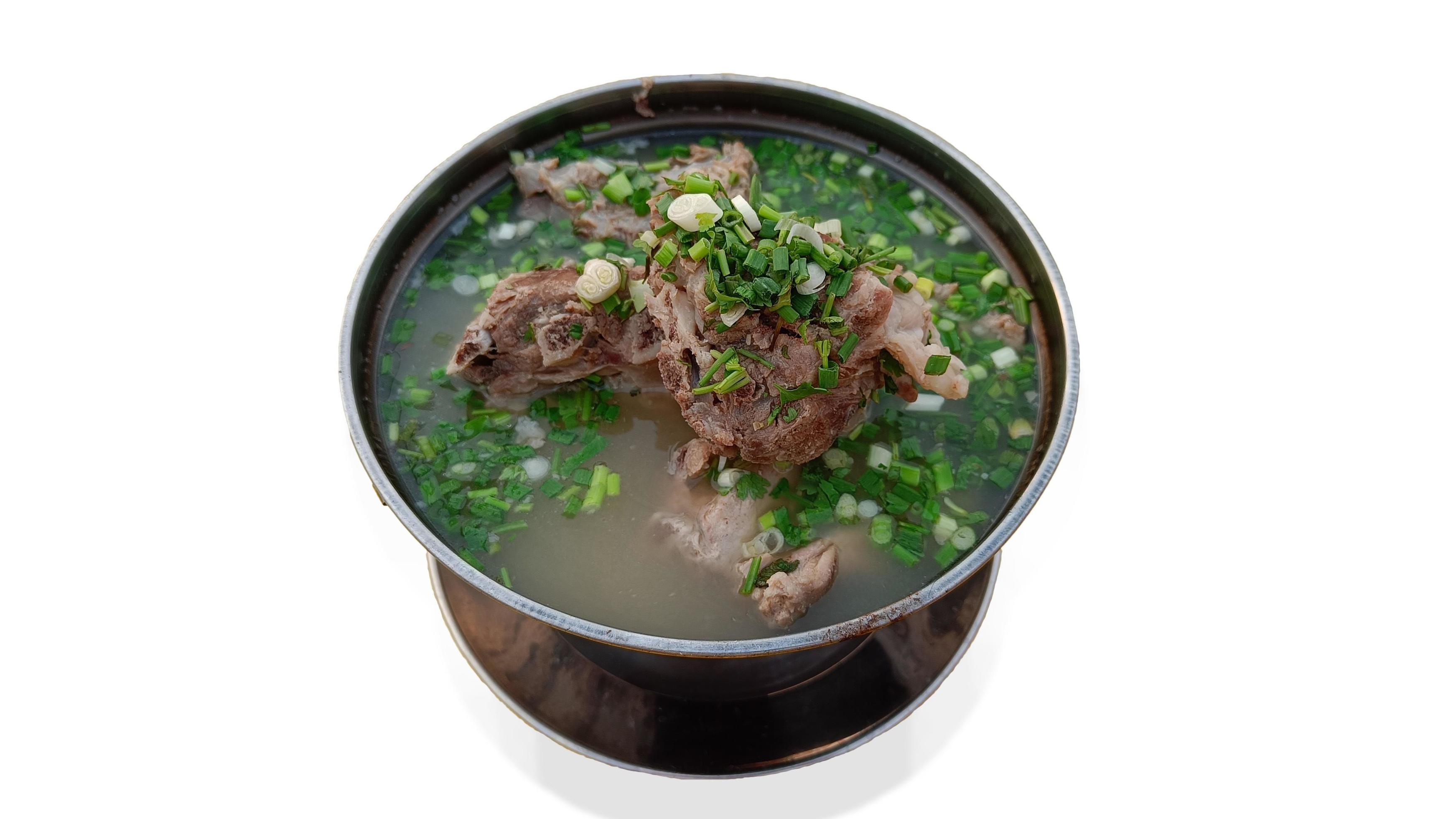 Thai food, spicy pork bone soup on a white background Stock Free