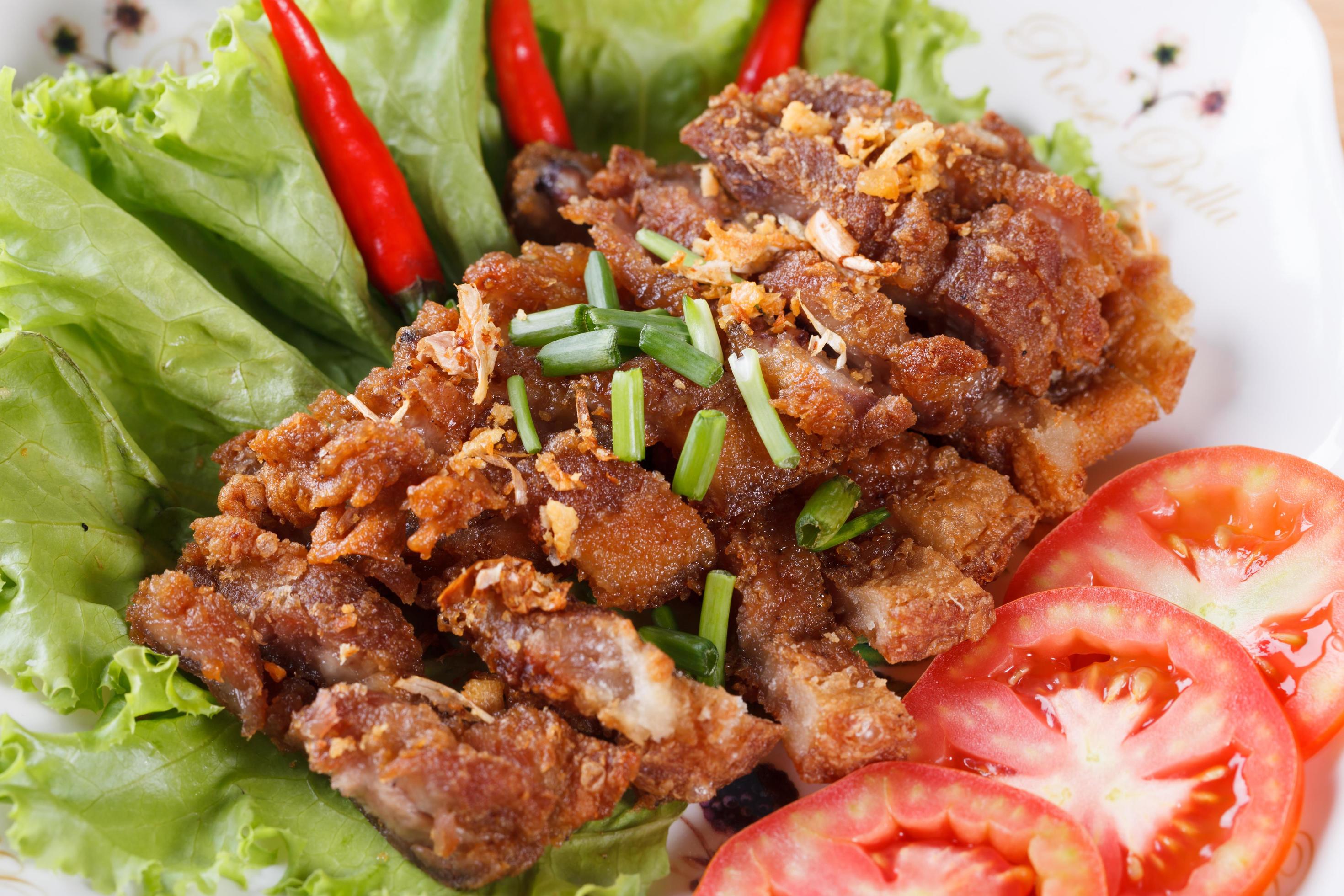 streaky pork fried with spicy dipping sauce, Thai food Stock Free