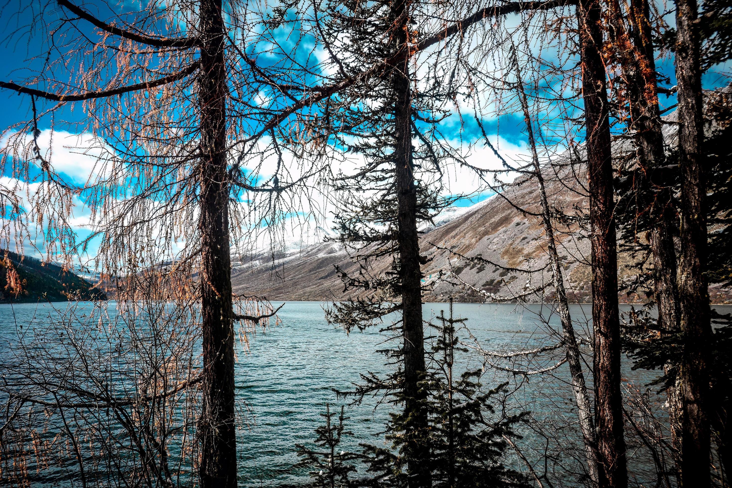 Spectacular scenery in the high mountains of western Sichuan, China, with different seasons Stock Free