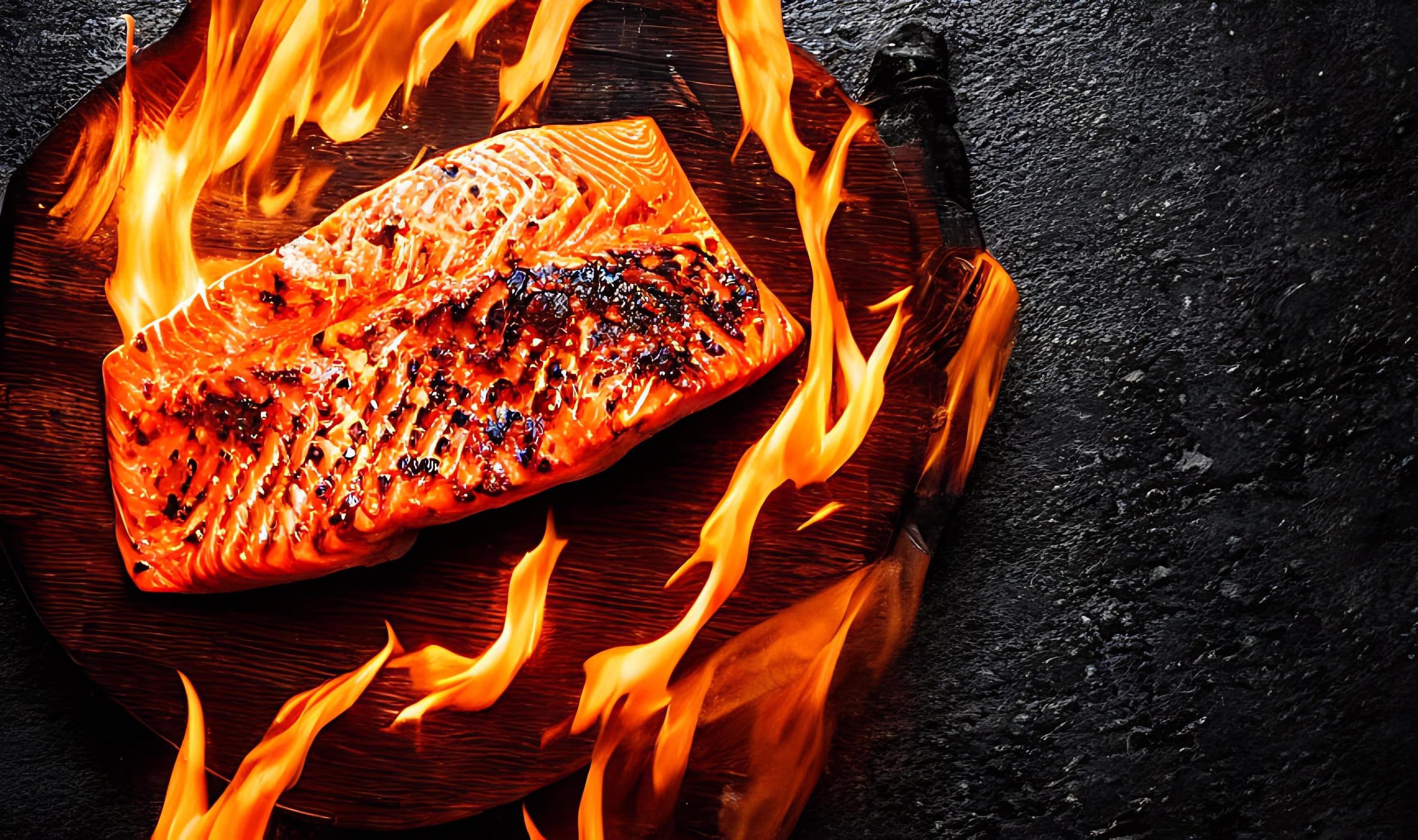 Grilled salmon. Healthy food baked salmon. Hot fish dish. Stock Free