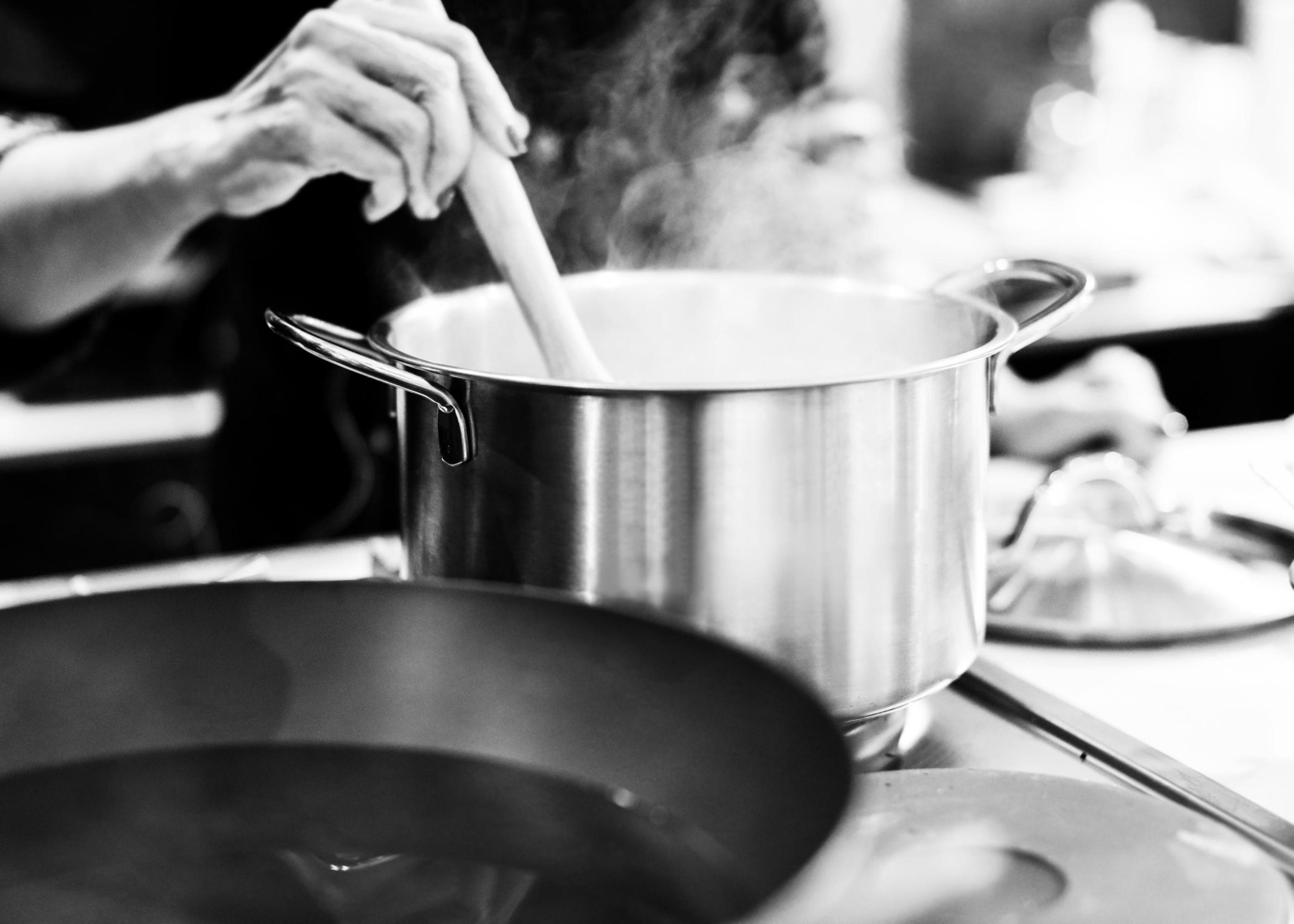 Chef cooking food in the kitchen, Chef preparing food Stock Free