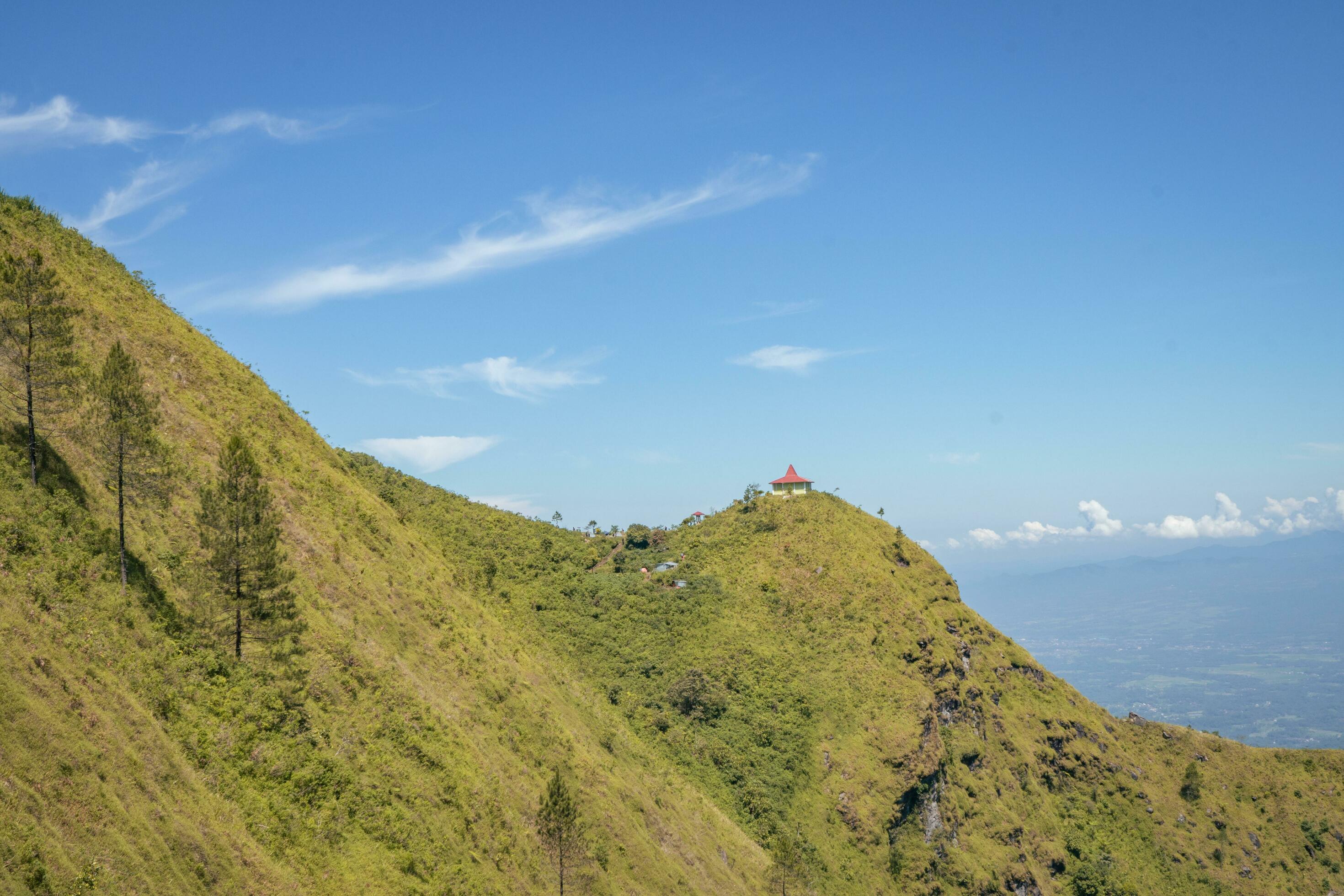 Landscape mountain when morning time sunlight summer vibes. The photo is suitable to use for adventure content media, nature poster and forest background. Stock Free