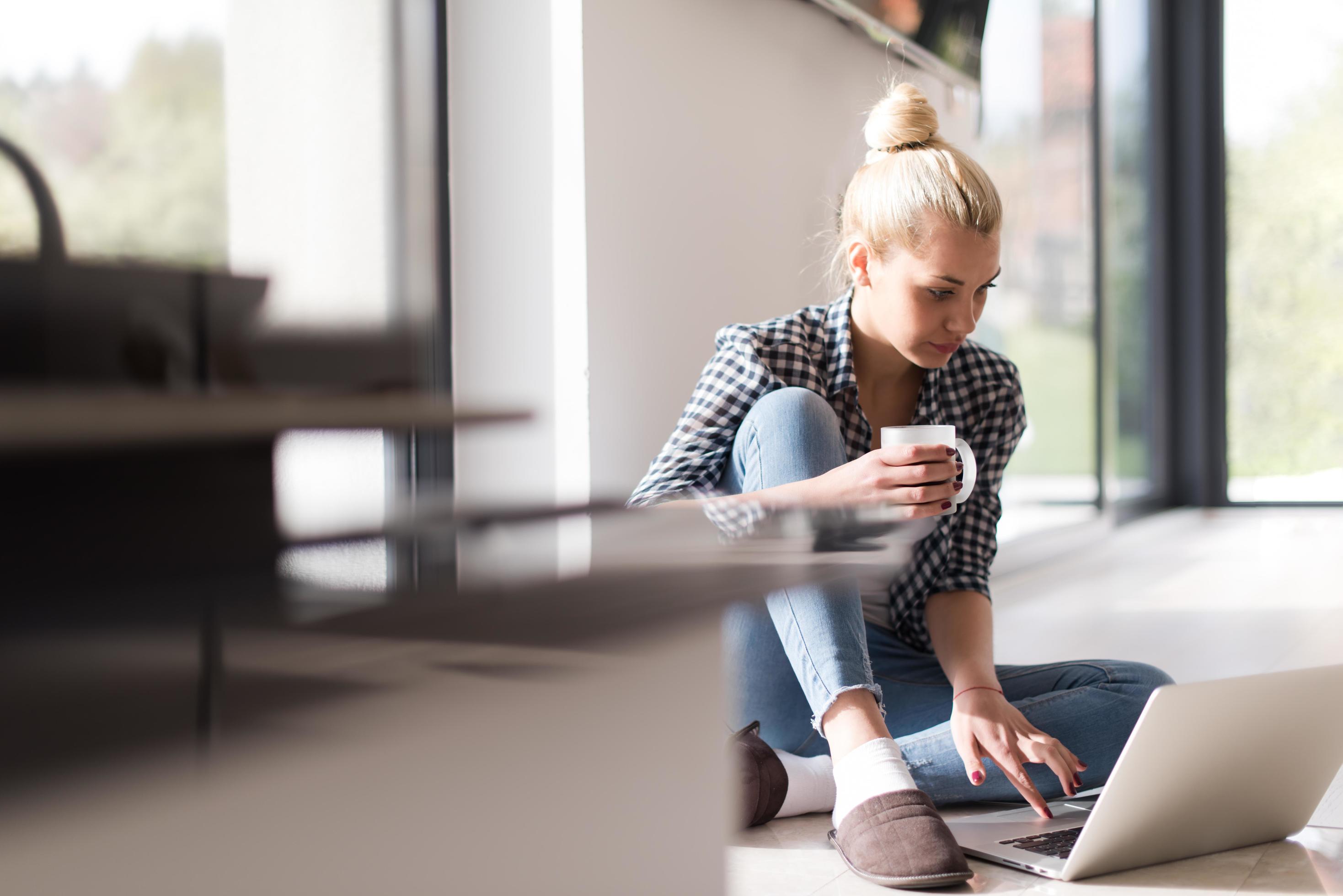 young woman drinking coffee enjoying relaxing lifestyle Stock Free