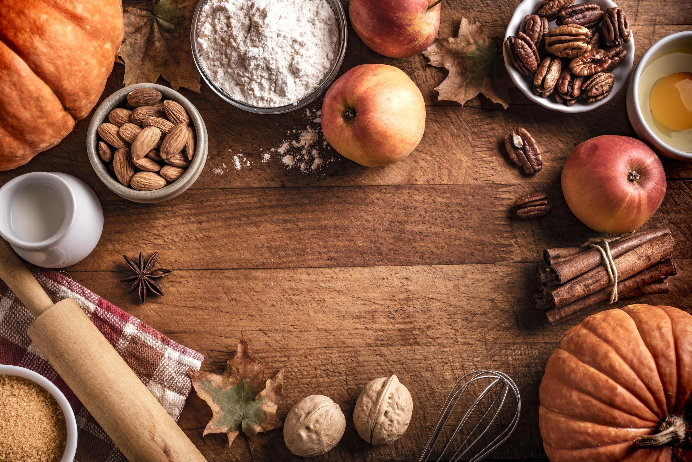 Autumn baking background with pumpkins, apples and nuts Stock Free