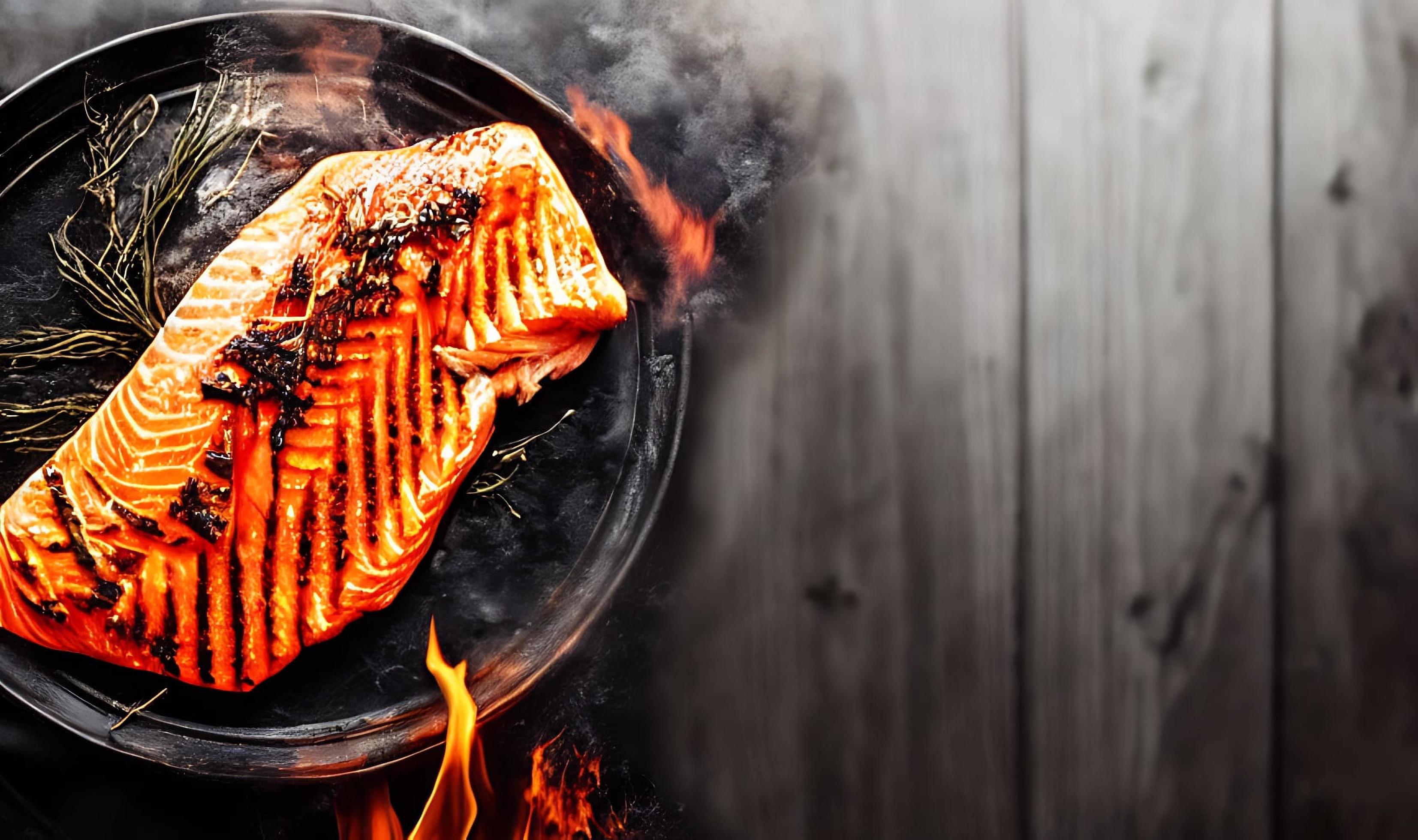 Grilled salmon. Healthy food baked salmon. Hot fish dish. Stock Free