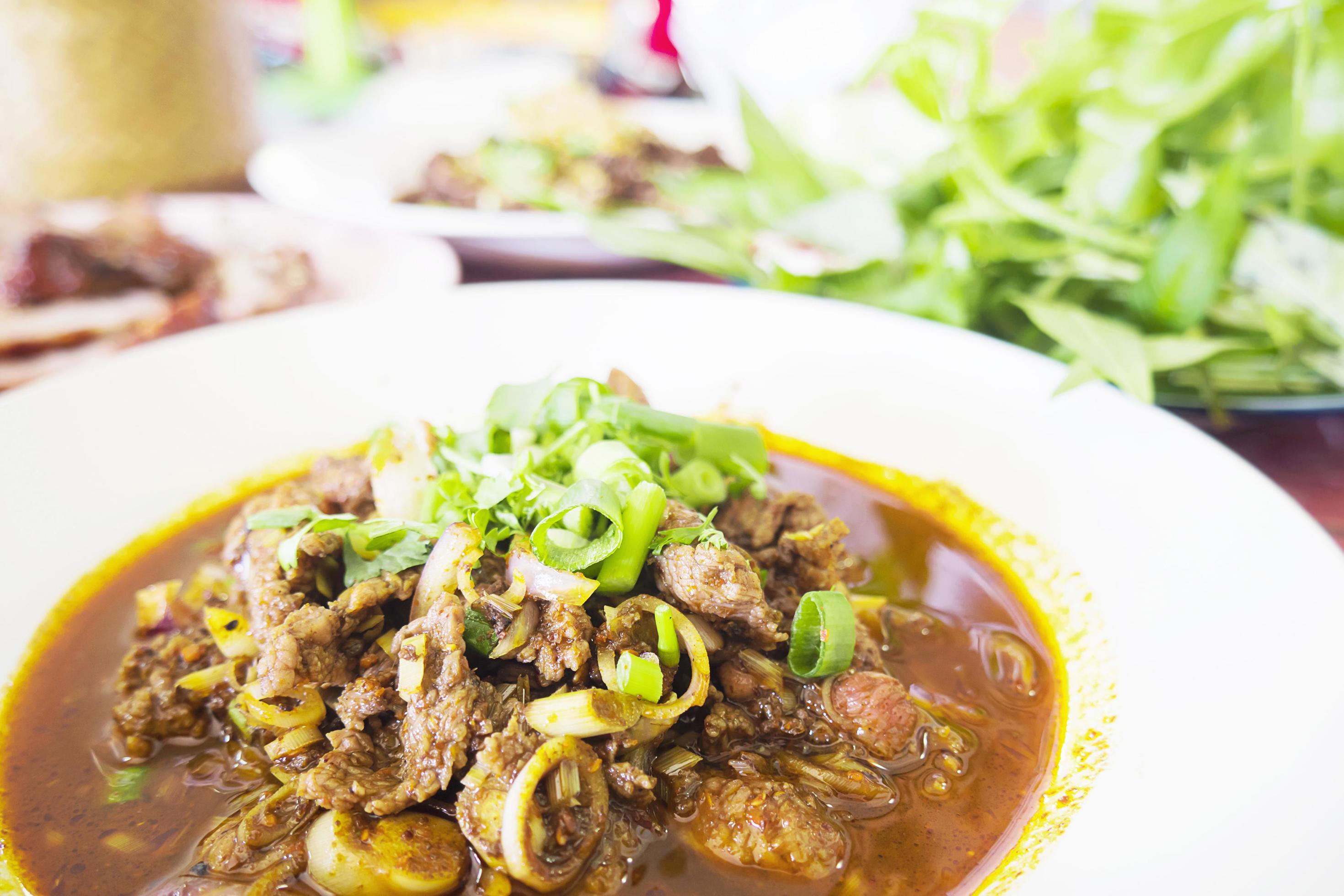 Spicy fried beef blood salad, Northern Thai style food Stock Free