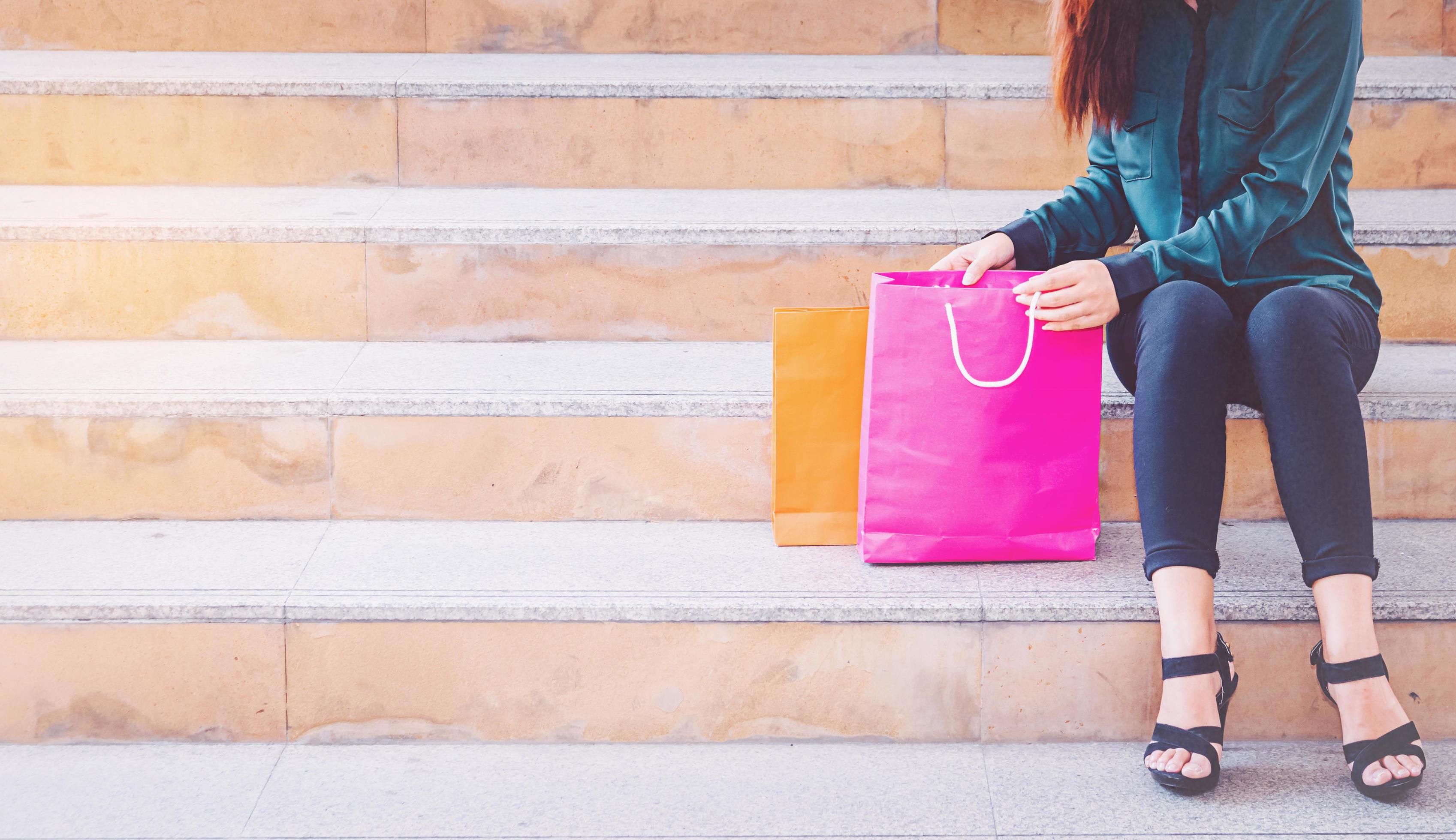 Happy woman with shopping bags enjoying in shopping. women shopping, lifestyle concept Stock Free