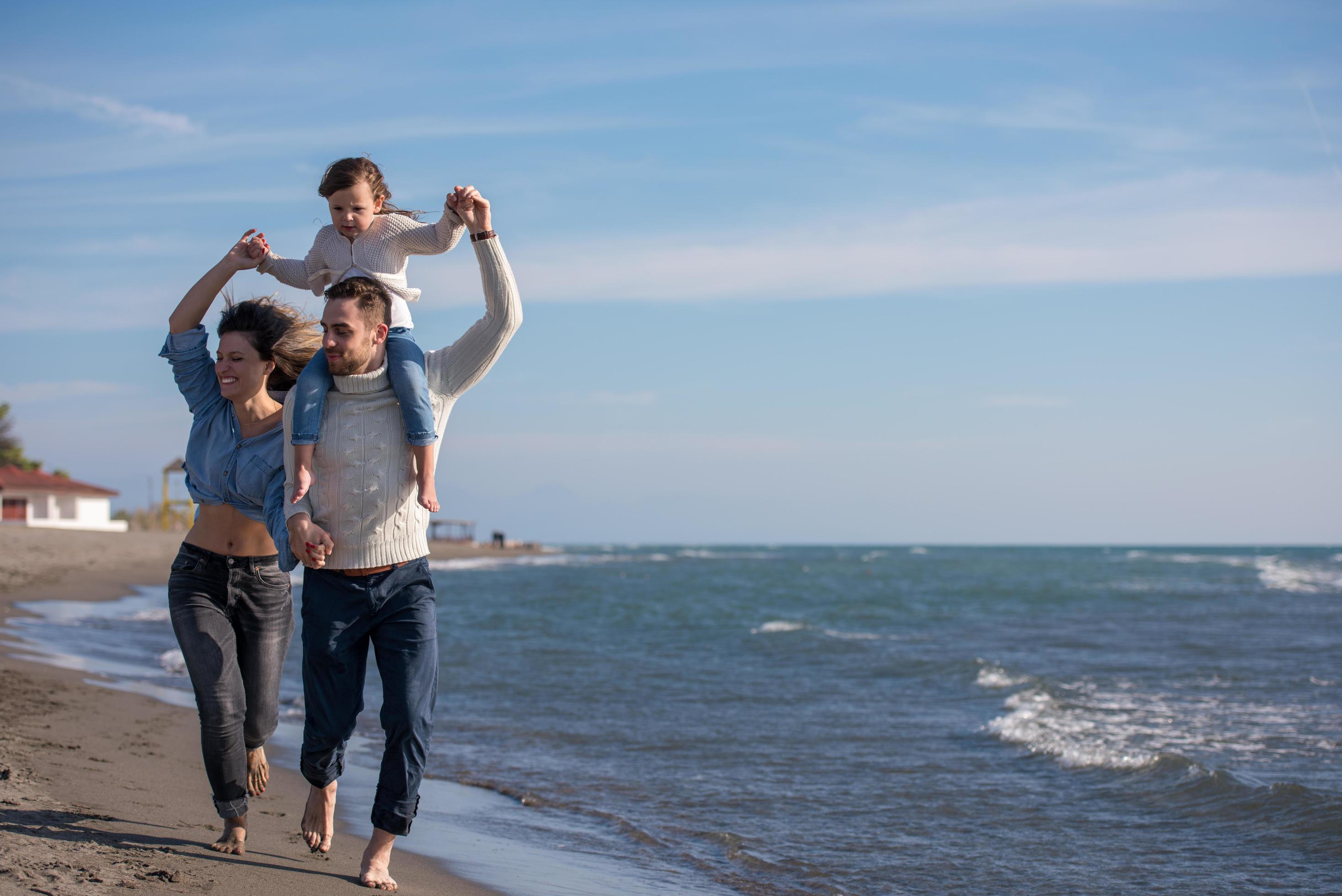 Young family enjoying vecation during autumn Stock Free