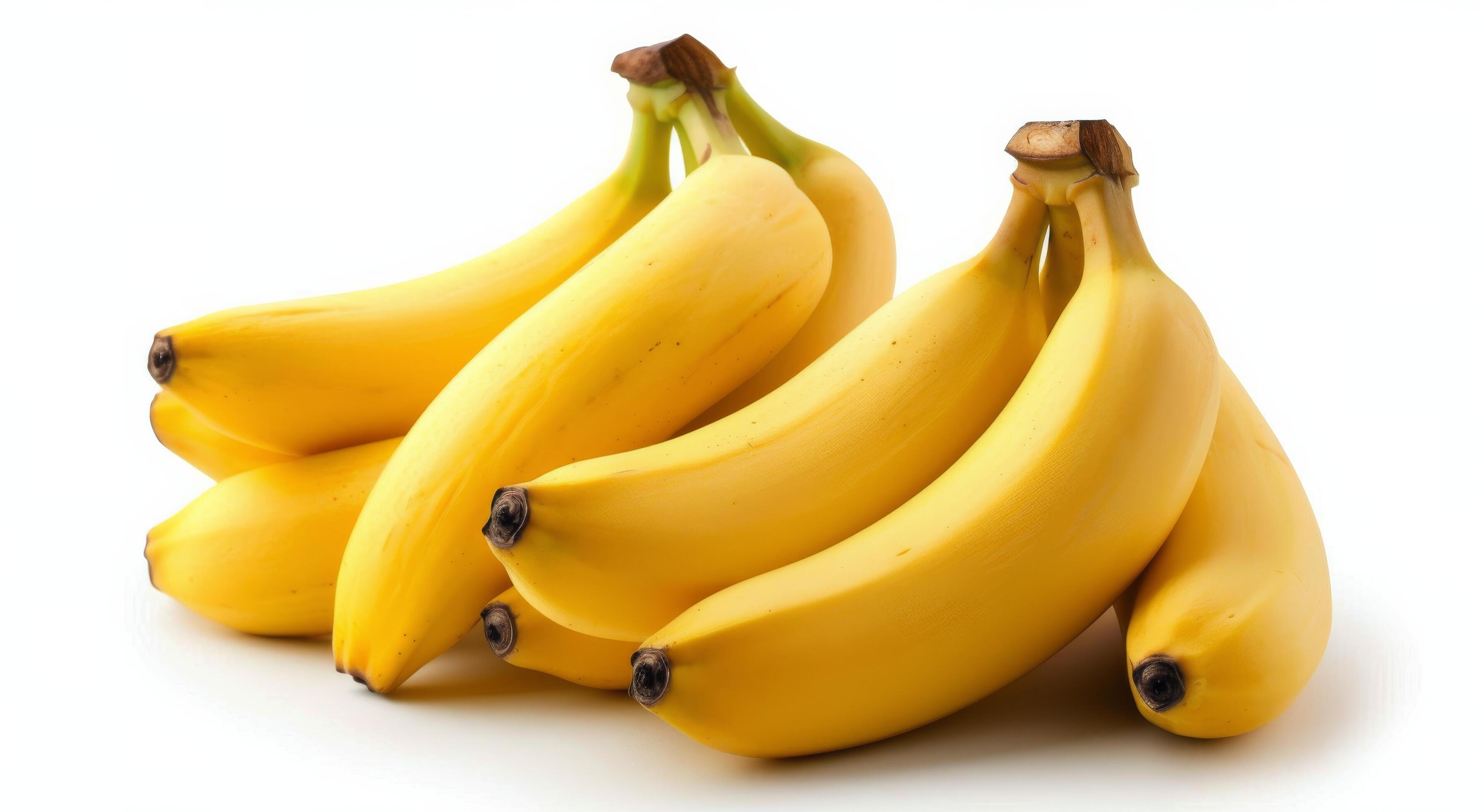 Yellow Bananas Stacked With Sliced Fruit Isolated on White Background Stock Free