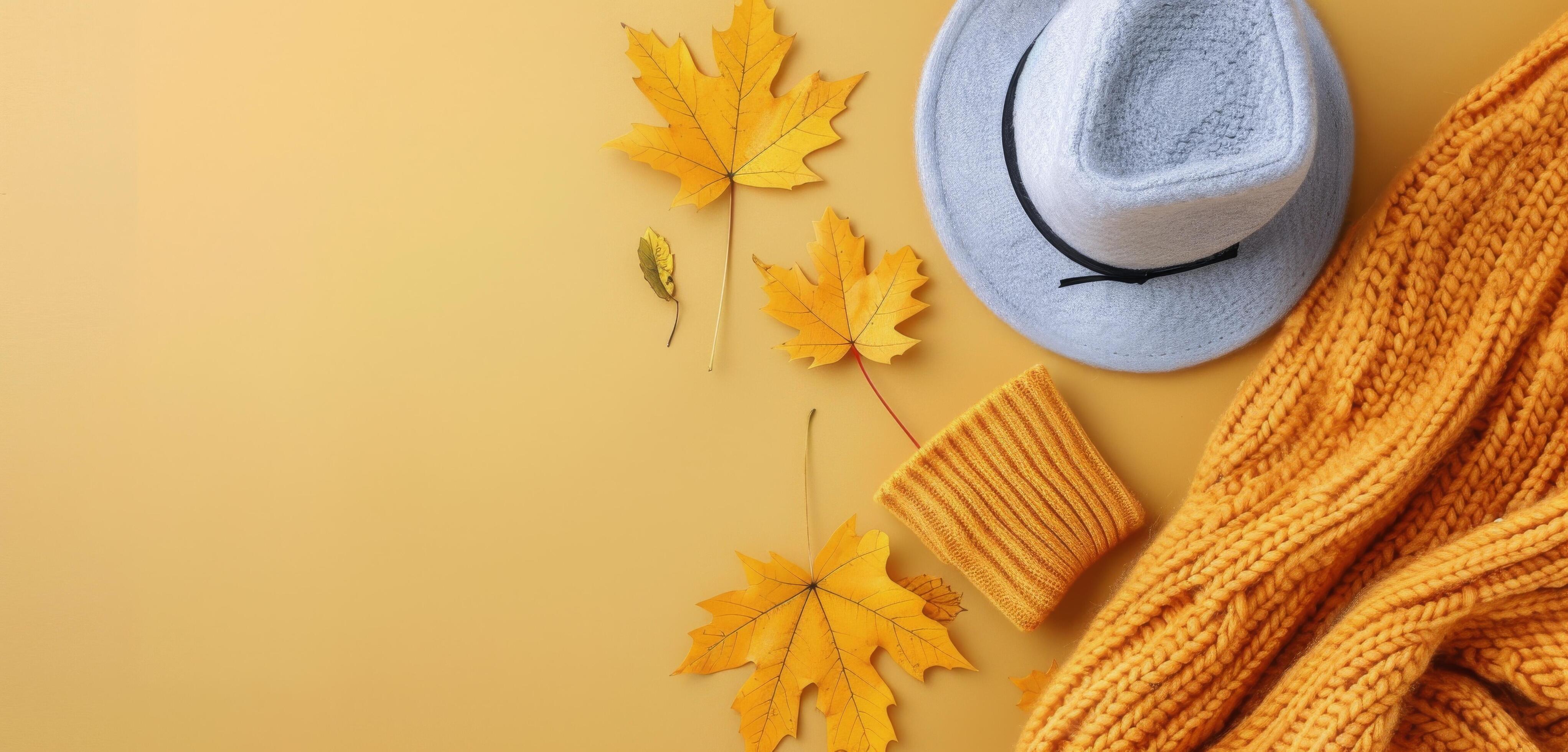 Cozy Autumn Accessories With Leaves on Yellow Background Stock Free