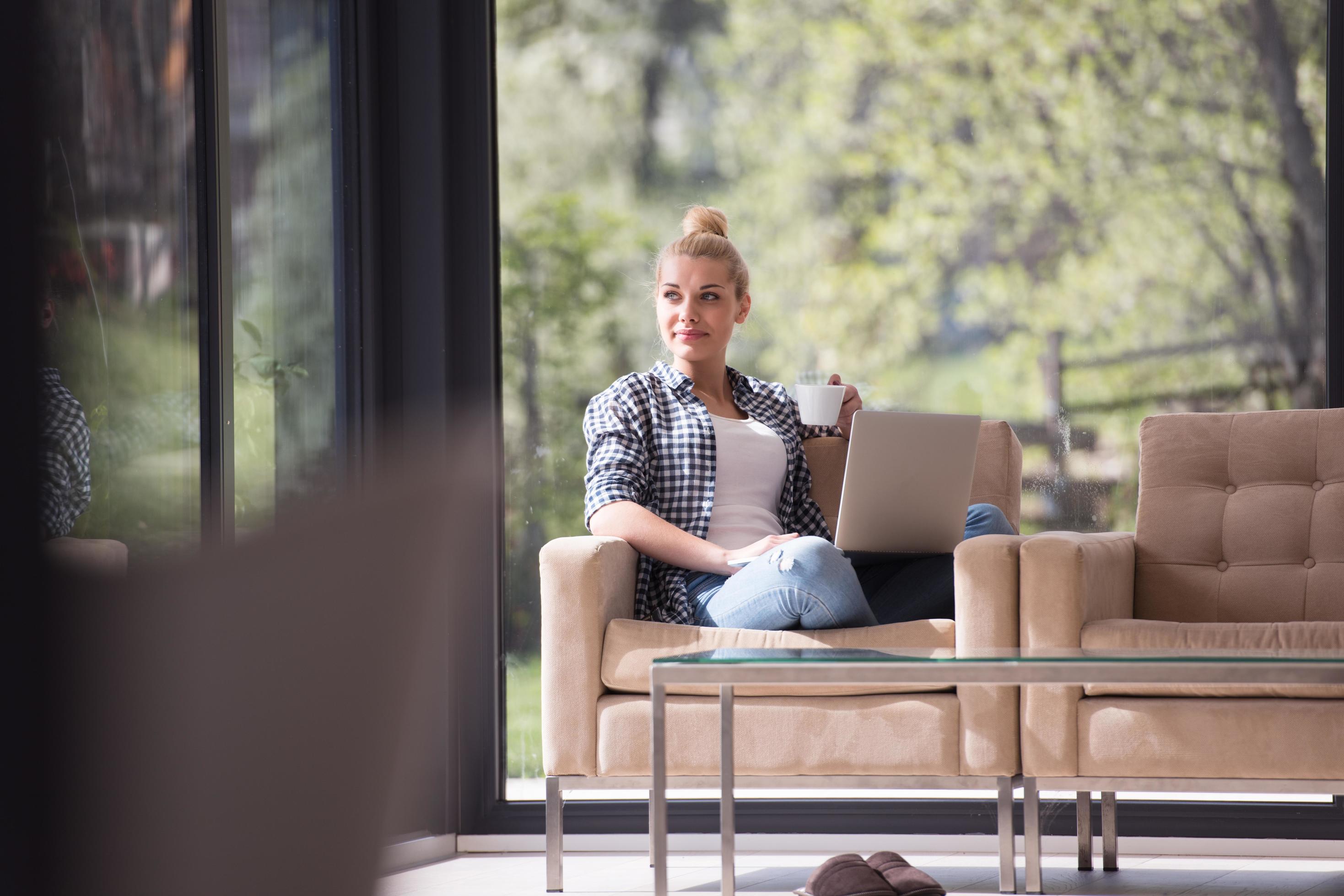 woman drinking coffee enjoying relaxing lifestyle Stock Free