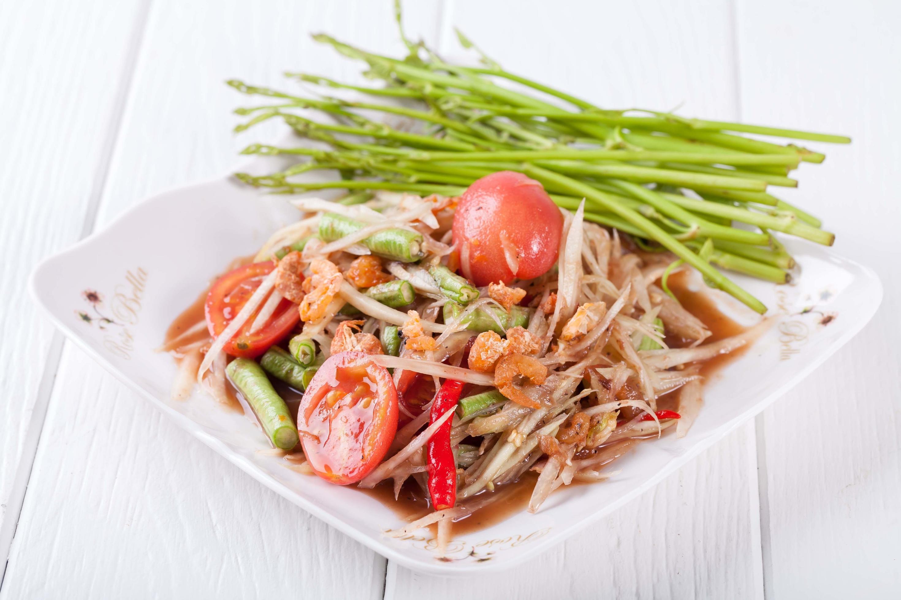 Somtum, papaya salad delicious food in thailand Stock Free